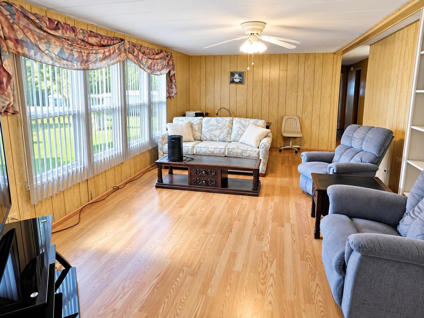 Laminate flooring and double pane windows.