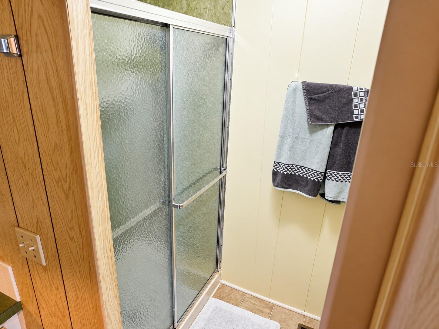 Step-in shower in primary.