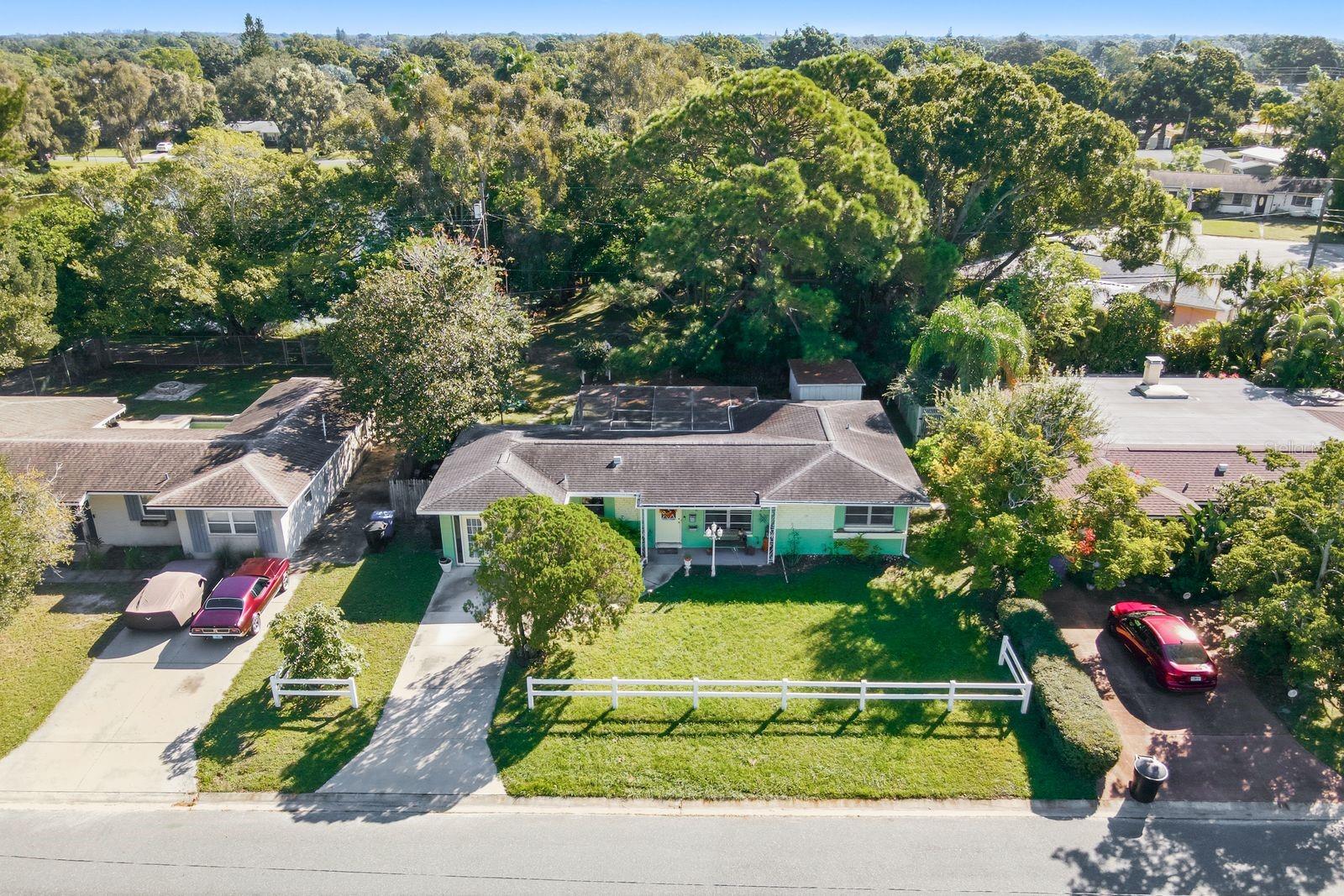 Front aerial- Roof will be replaced prior to closing