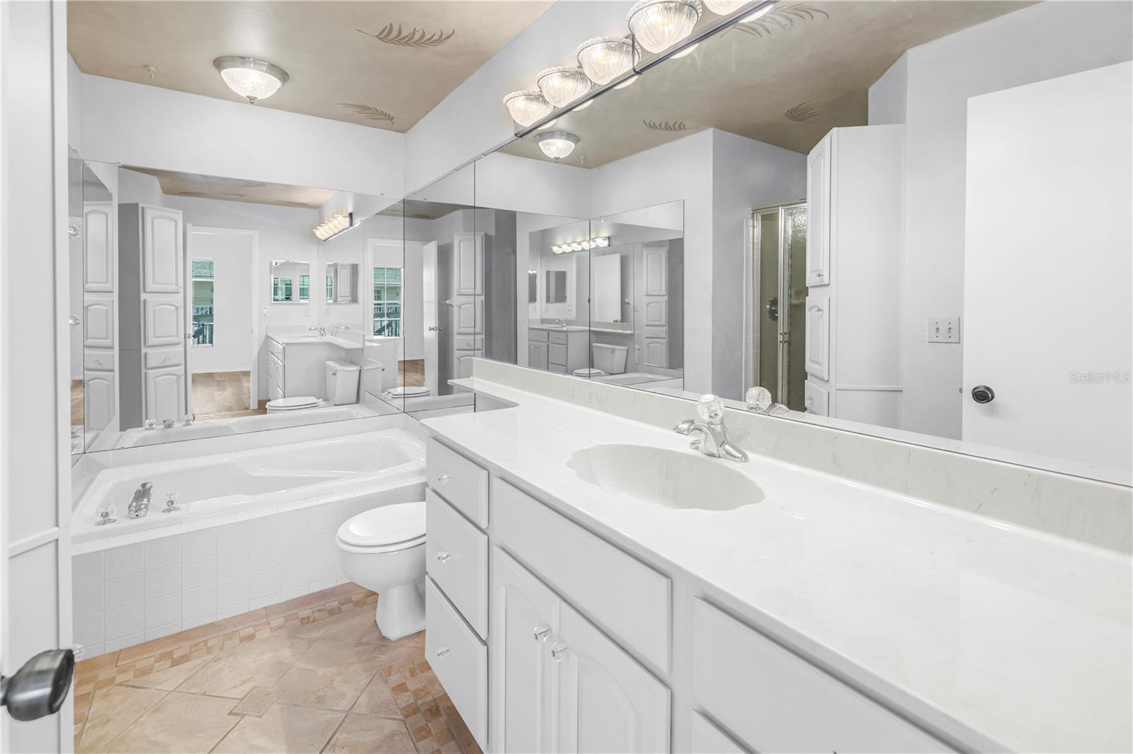 Primary bathroom with soaking tub and shower