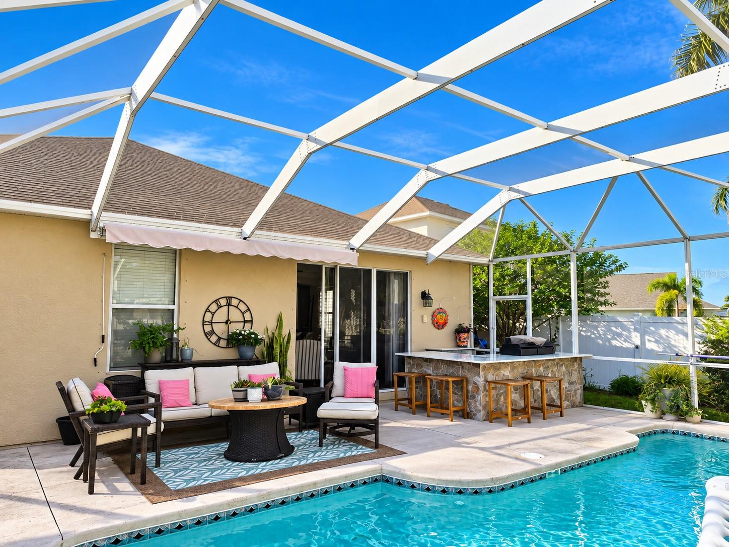 Heated pool with just added new outdoor kitchen.