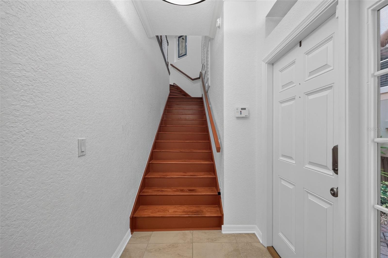 Wood staircase to 2nd floor