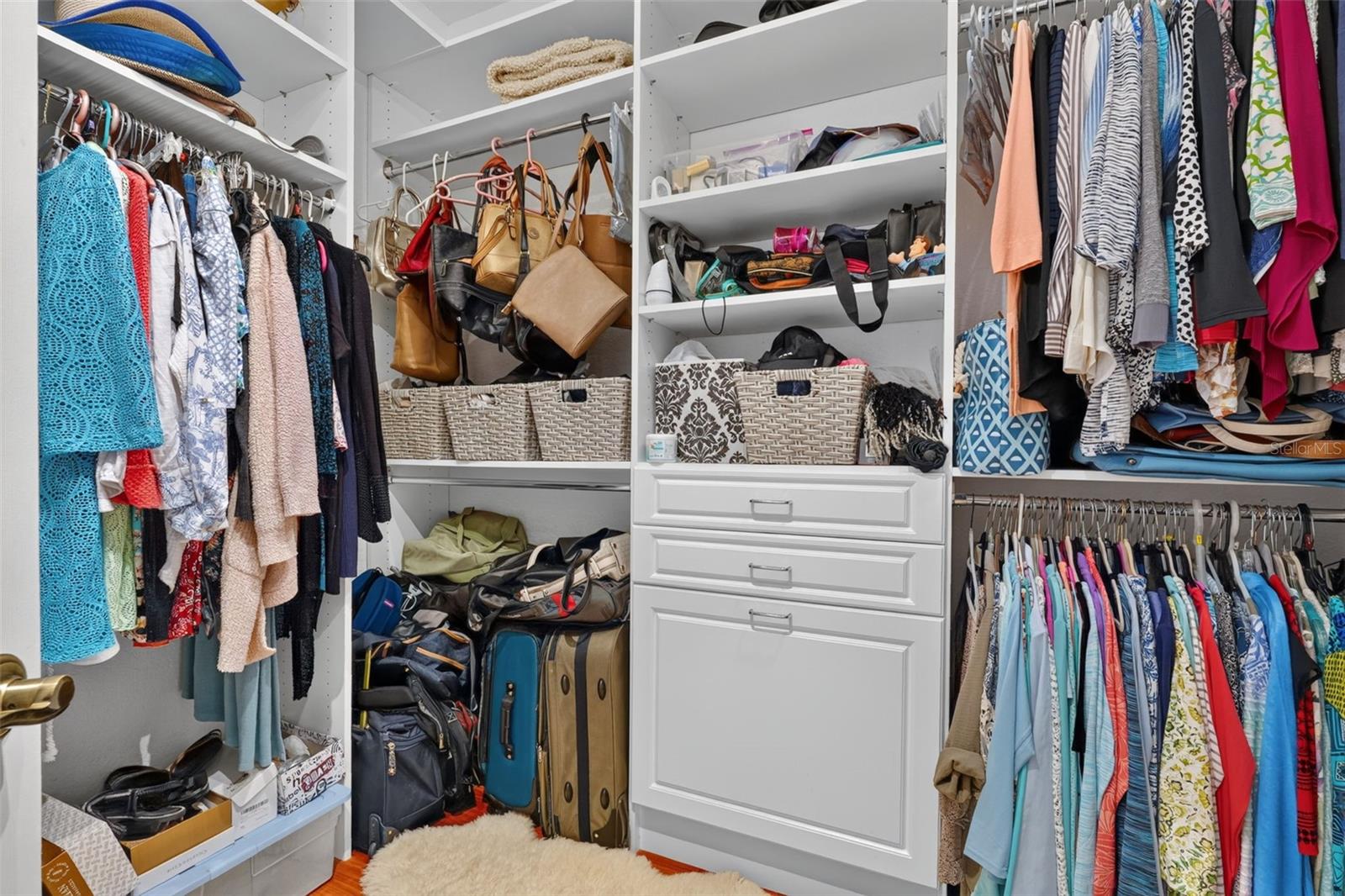 Primary walk-in custom closet
