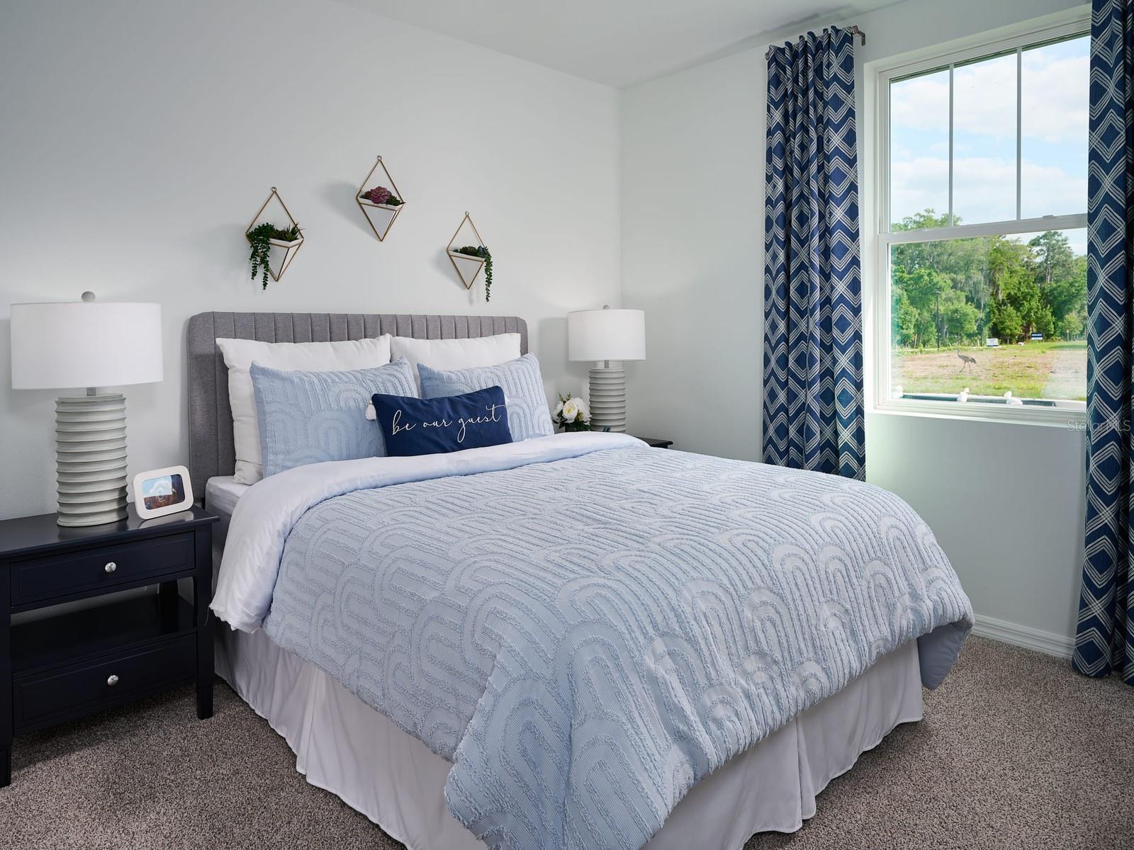 Welcome to Hamilton Bluff, where spacious living and timeless style come together in a thoughtfully designed home. This versatile floorplan features four generously sized bedrooms, three full baths, and a welcoming family room, offering exceptional flexibility for growing families and modern lifestyles. At the heart of the home, the open-concept kitchen seamlessly connects to the dining area and expansive great room, creating an inviting space perfect for entertaining, hosting celebrations, or enjoying everyday moments with loved ones. Designed with both comfort and functionality in mind, this beautifully crafted home offers the perfect balance of warmth, convenience, and contemporary appeal.