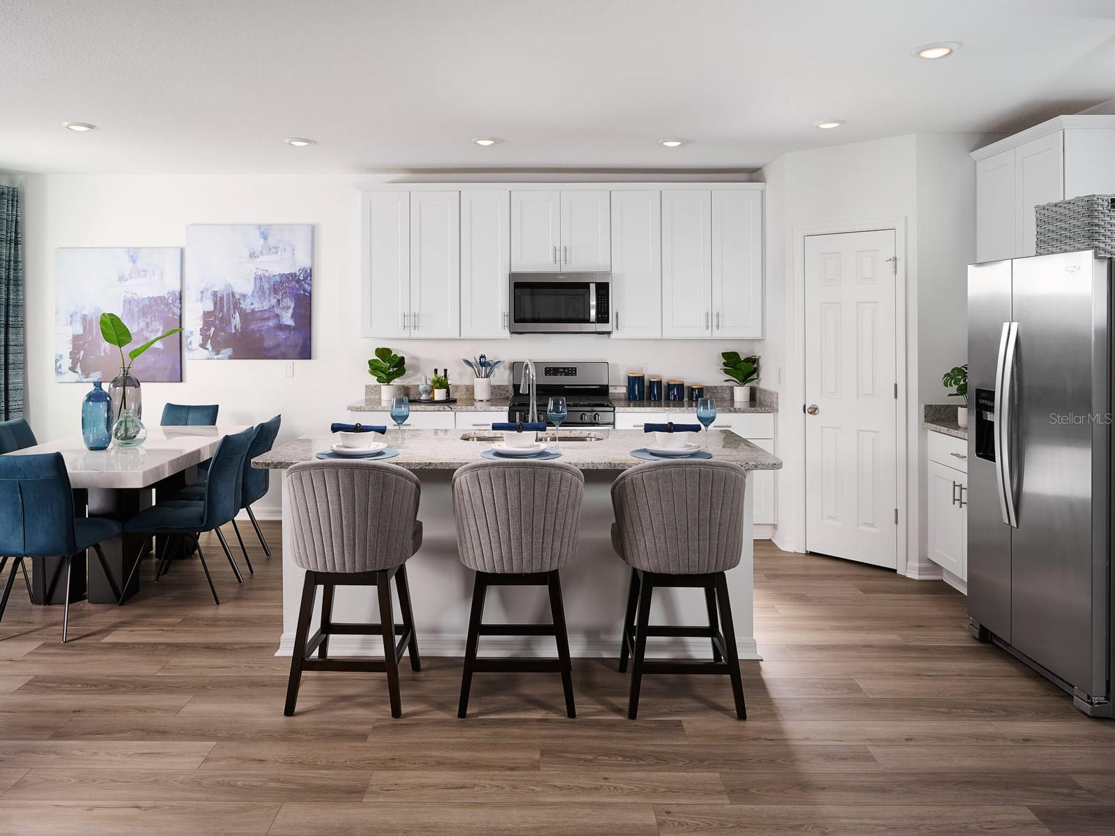 Welcome to Hamilton Bluff, where spacious living and timeless style come together in a thoughtfully designed home. This versatile floorplan features four generously sized bedrooms, three full baths, and a welcoming family room, offering exceptional flexibility for growing families and modern lifestyles. At the heart of the home, the open-concept kitchen seamlessly connects to the dining area and expansive great room, creating an inviting space perfect for entertaining, hosting celebrations, or enjoying everyday moments with loved ones. Designed with both comfort and functionality in mind, this beautifully crafted home offers the perfect balance of warmth, convenience, and contemporary appeal.
