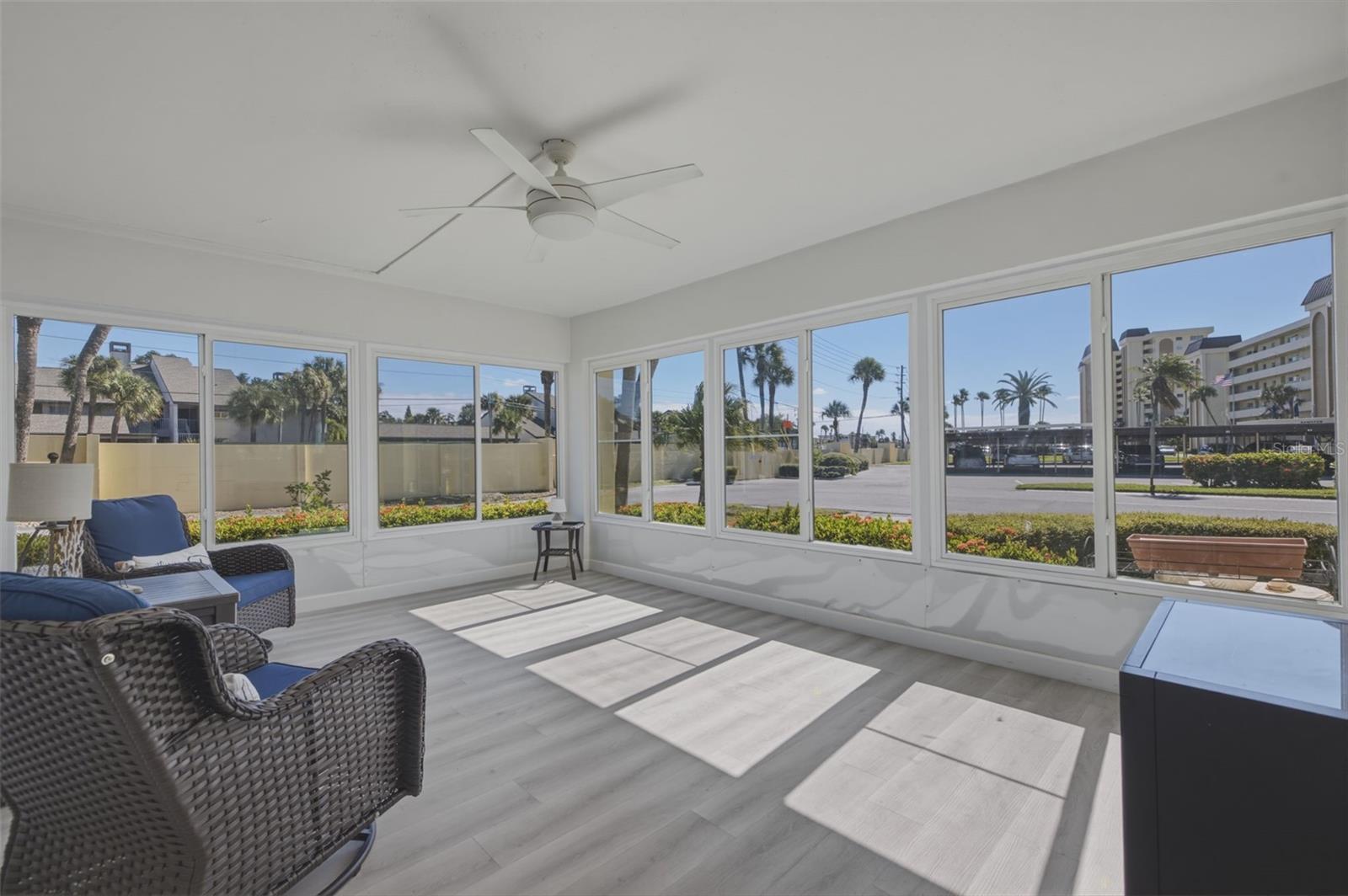 Spacious sunroom bringing the outside in!