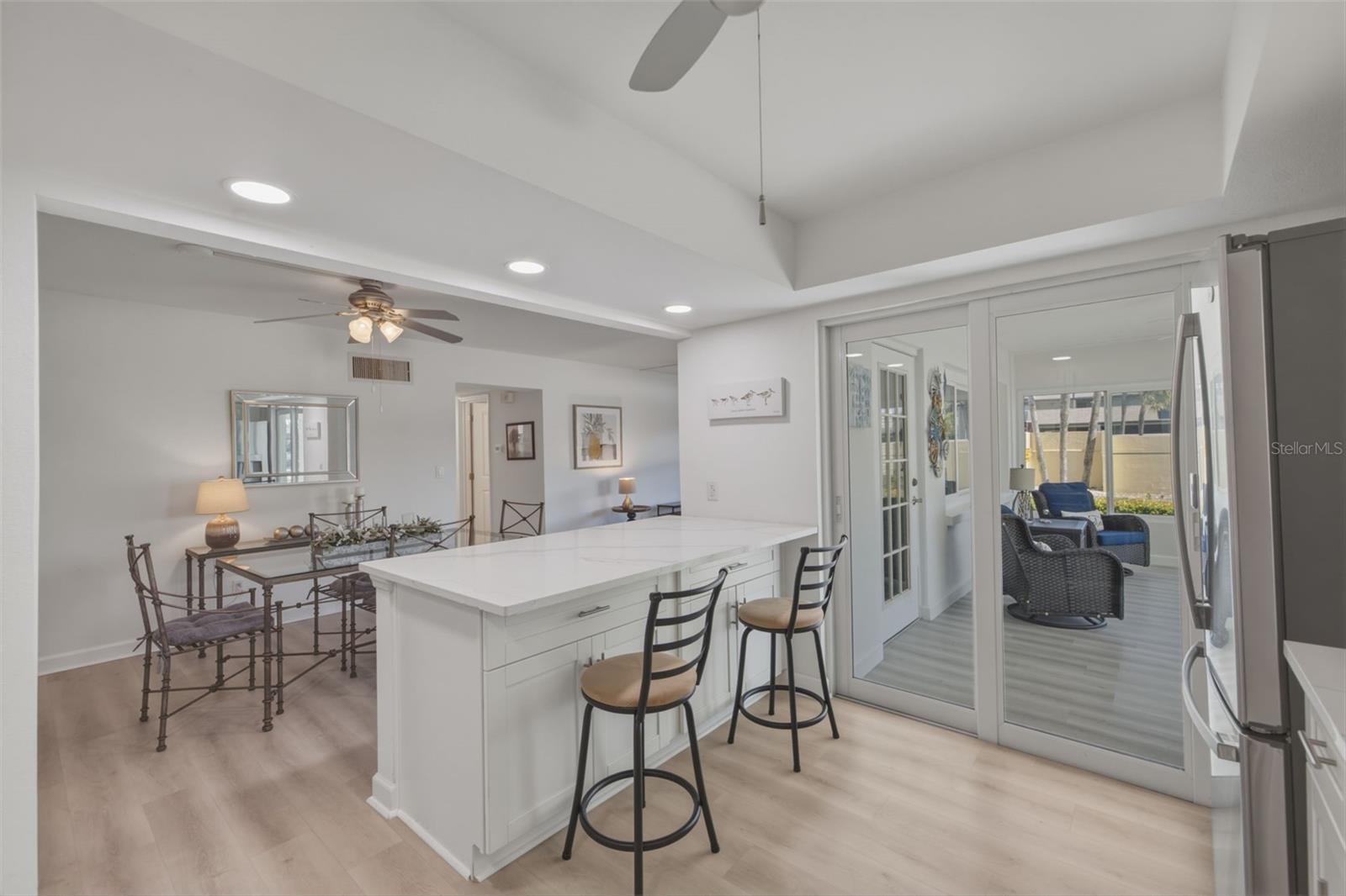 Easy access to kitchen from sunroom entry!