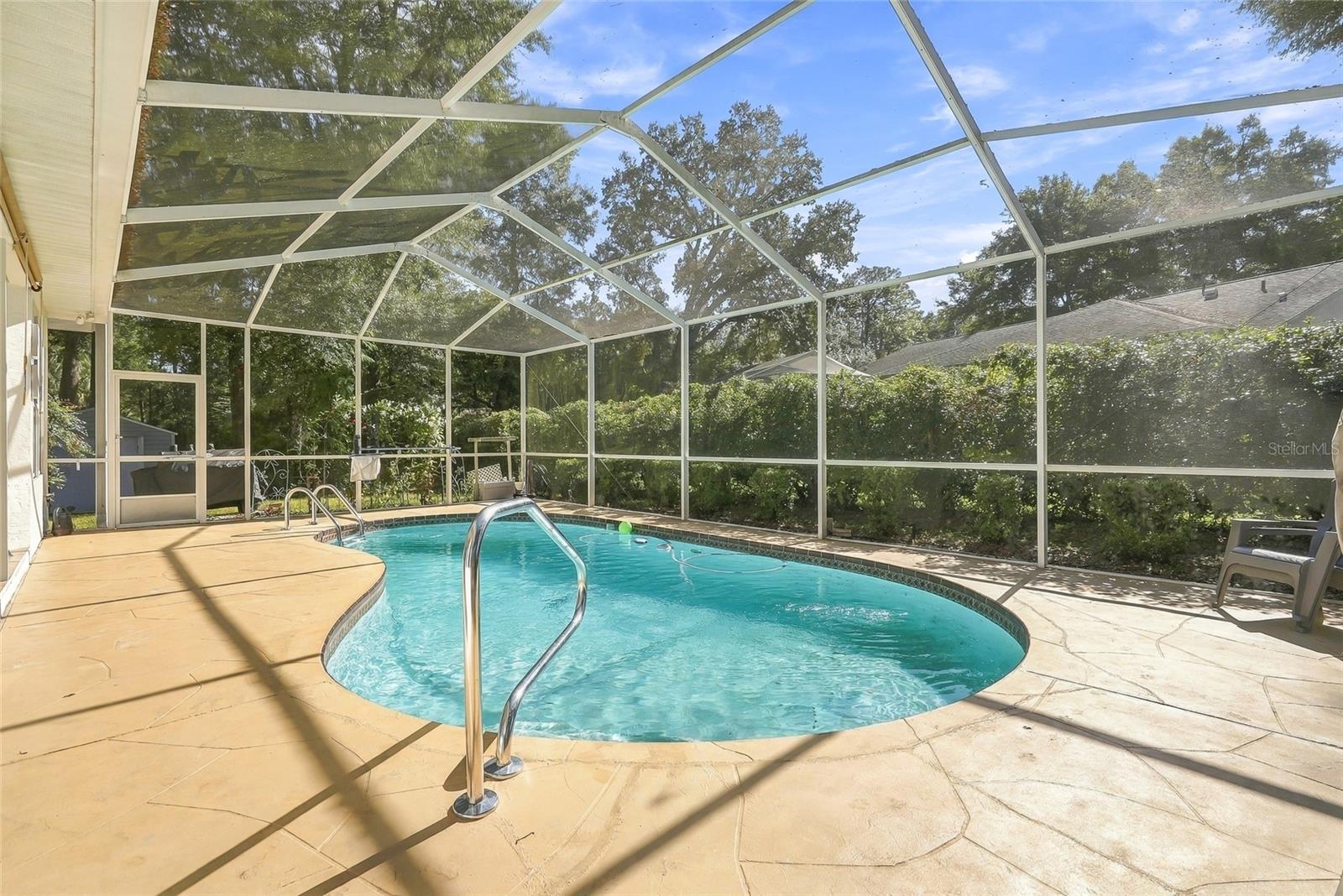 Screened in lanai with In-ground Heated POOL