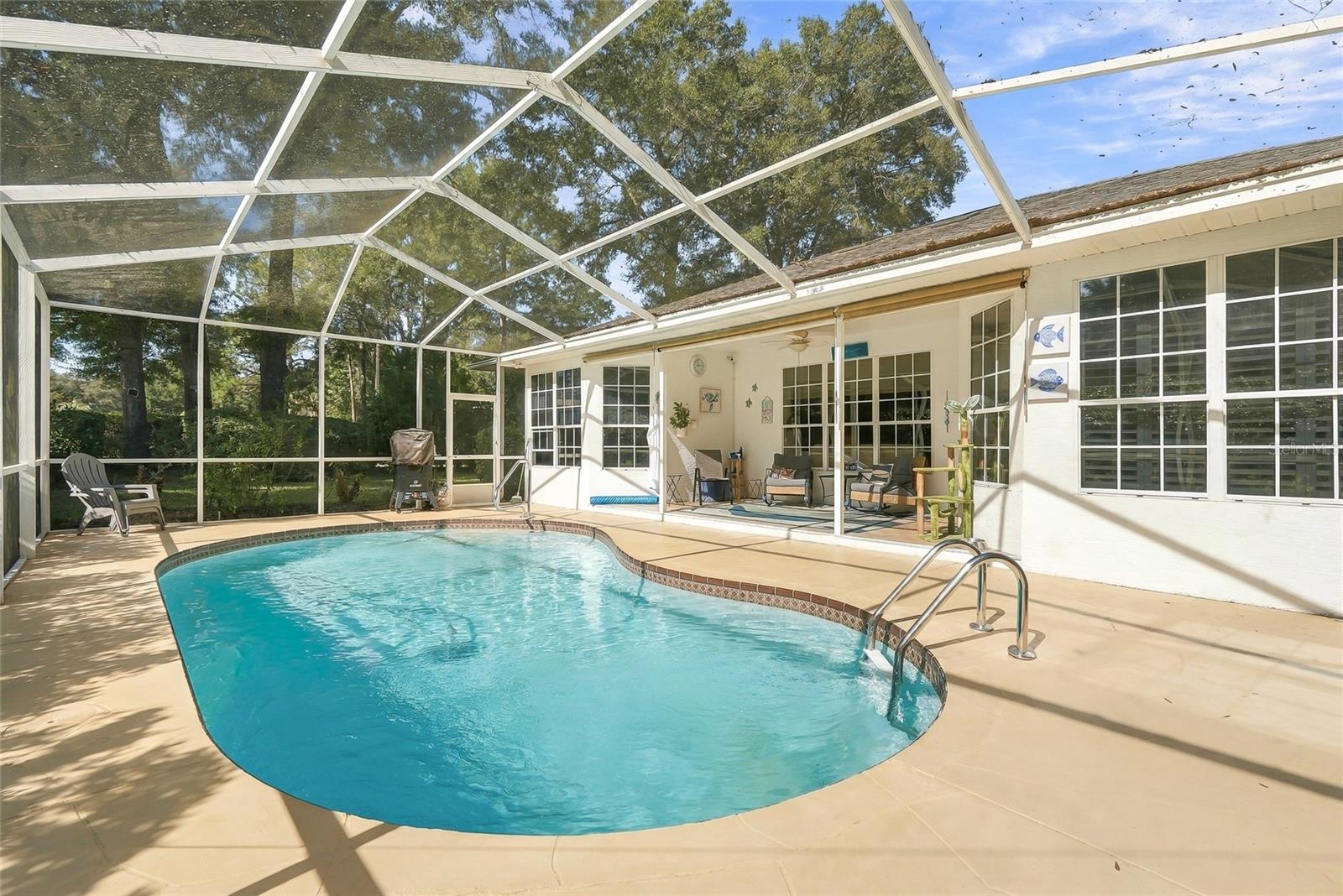 Screened in lanai with In-ground Heated POOL