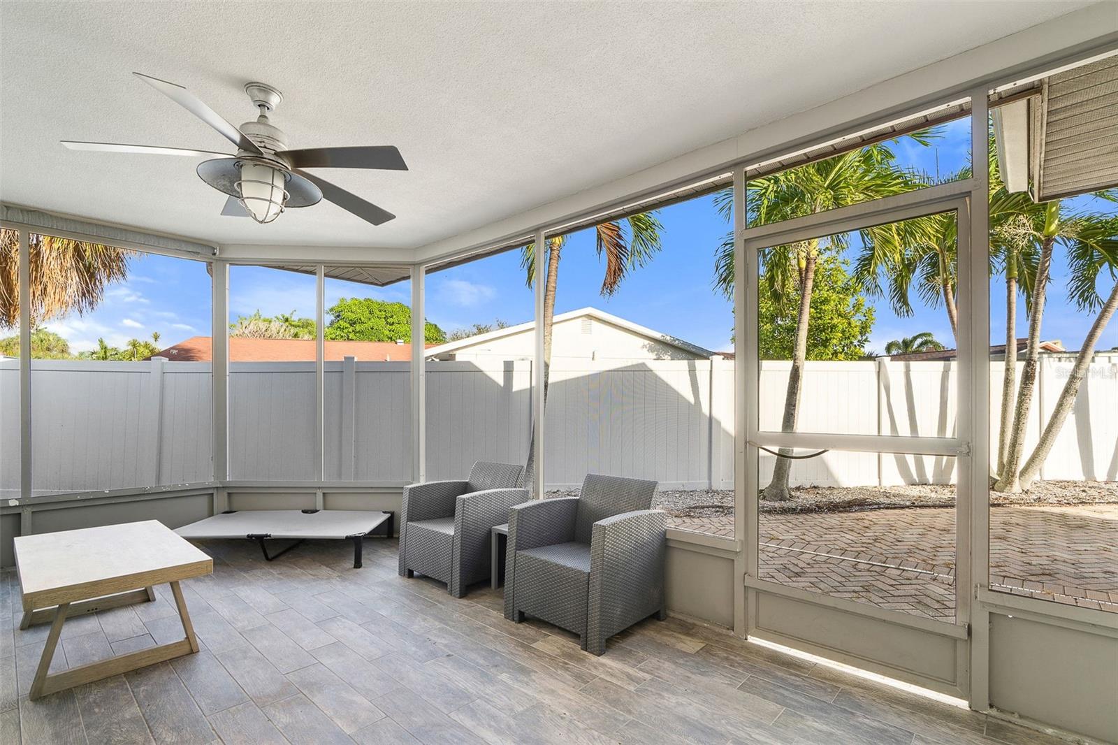 Screened patio to pool and patio area.