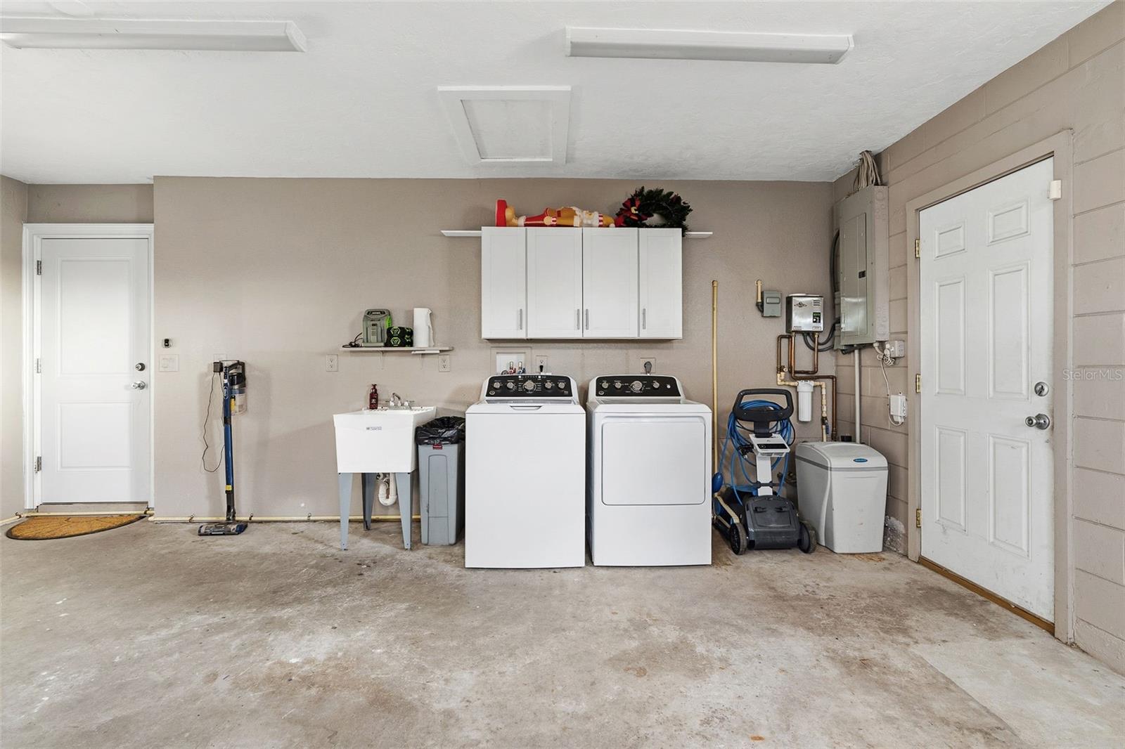 Laundry area in garage.
