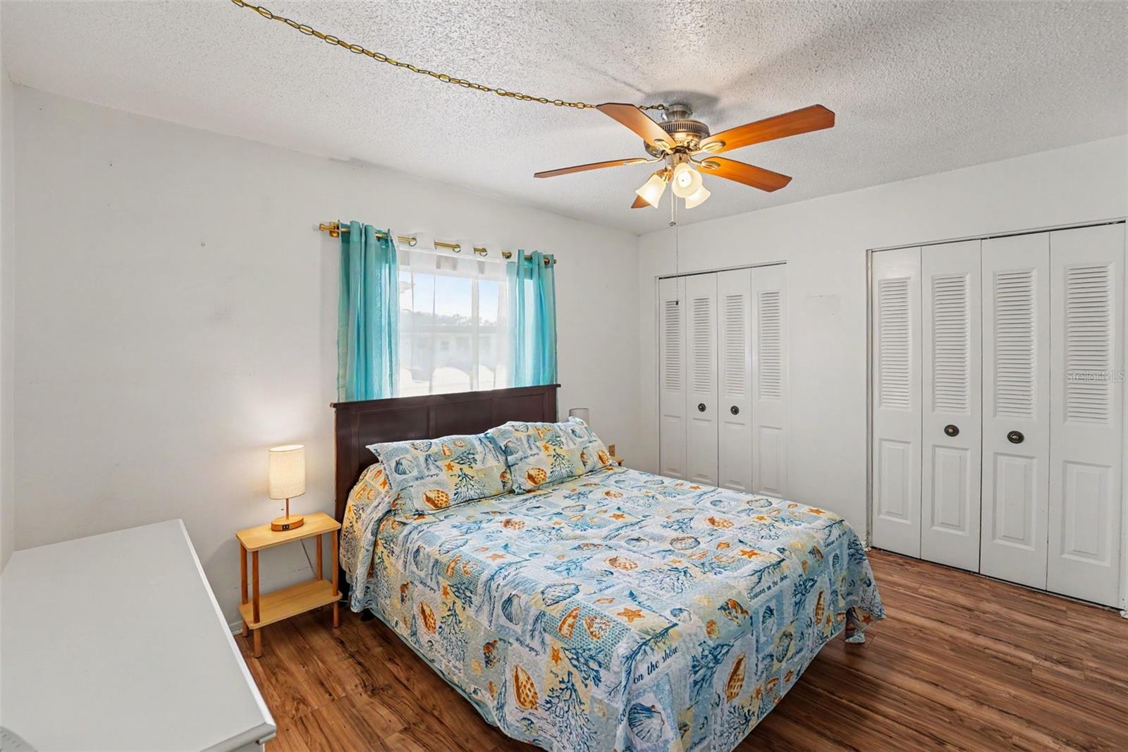 Primary Bedroom with LVP Flooring