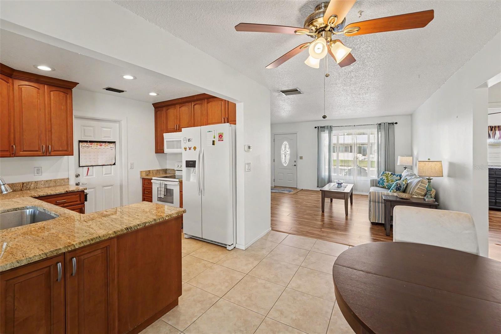 Kitchen and Dining Area with Tile Flooring