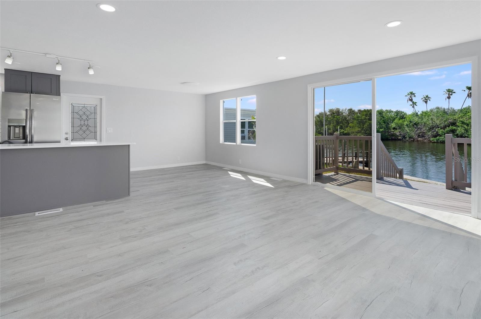 Livinroom facing kitchen island east and waterfront Livinroom facing kitchen island east and waterfront