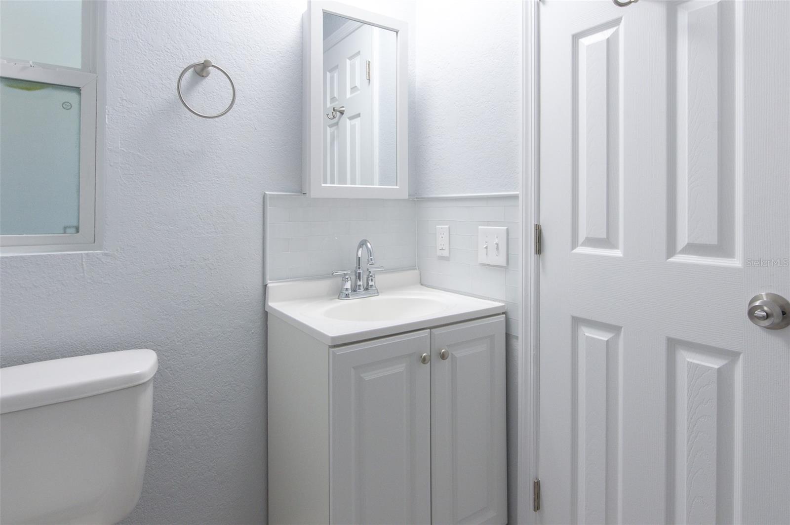 Bathroom 1 to Bedroom 1 with walkin shower