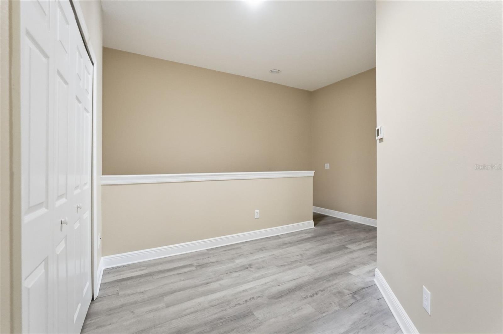 Landing area, room for a desk or play area