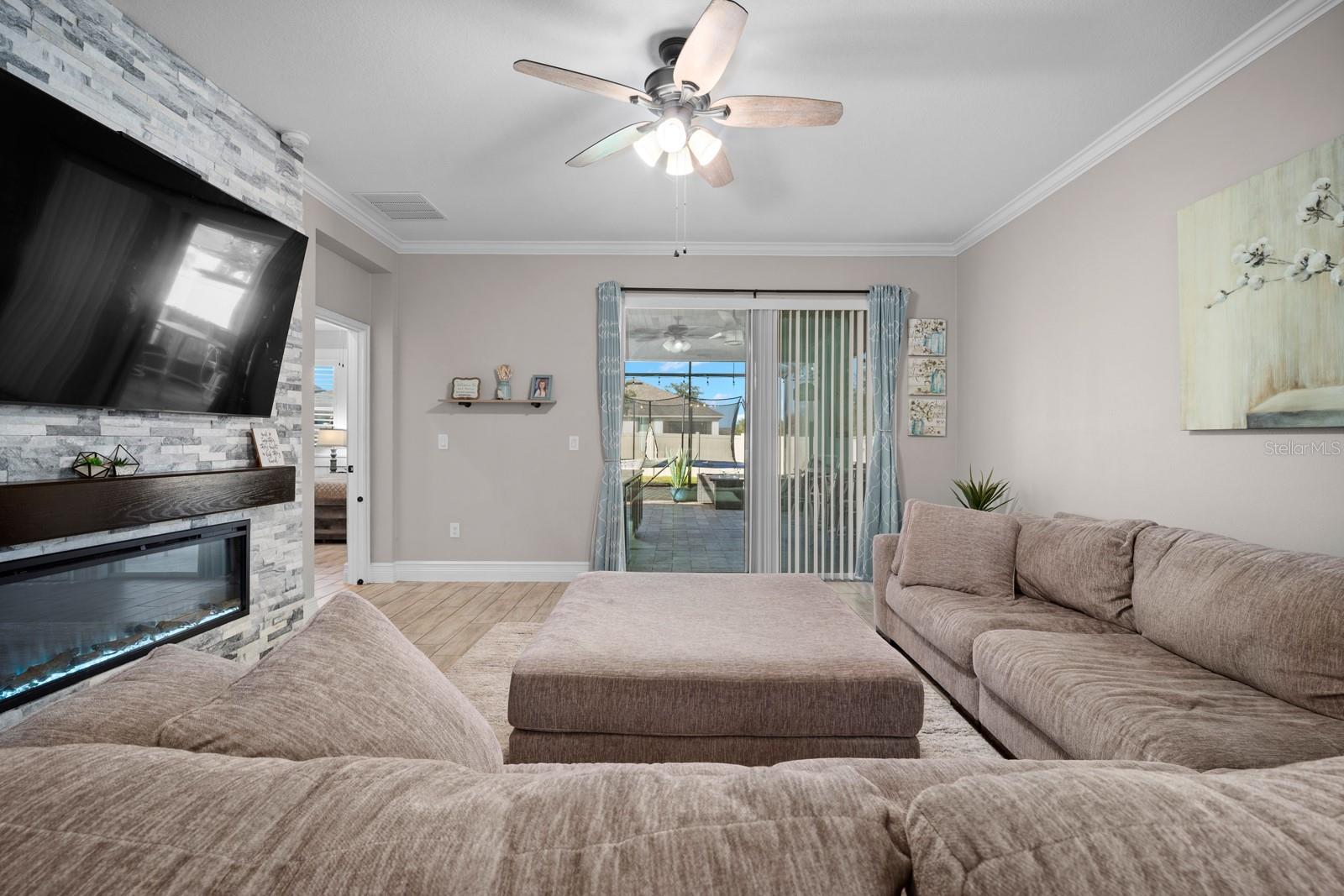Family room view to the sliding doors and screened lanai
