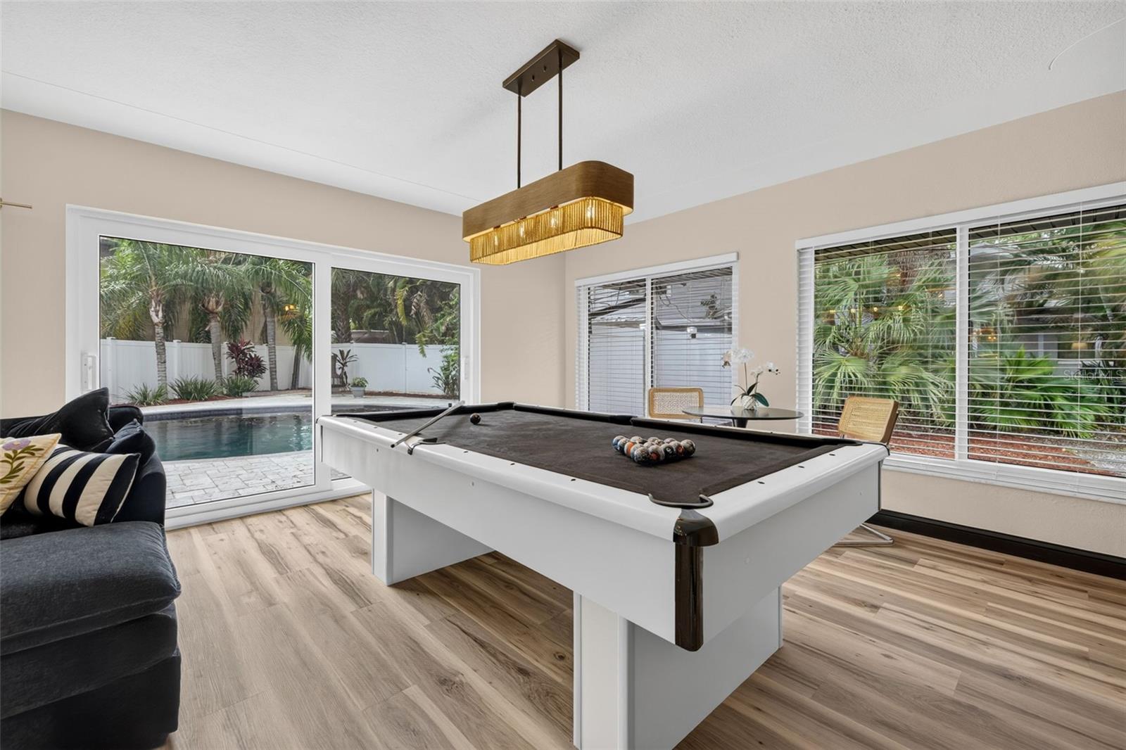 Family room with sliders to pool
