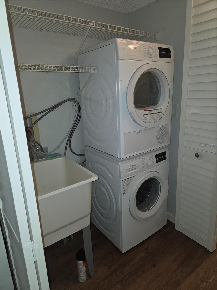 Inside laundry closet with utility sink