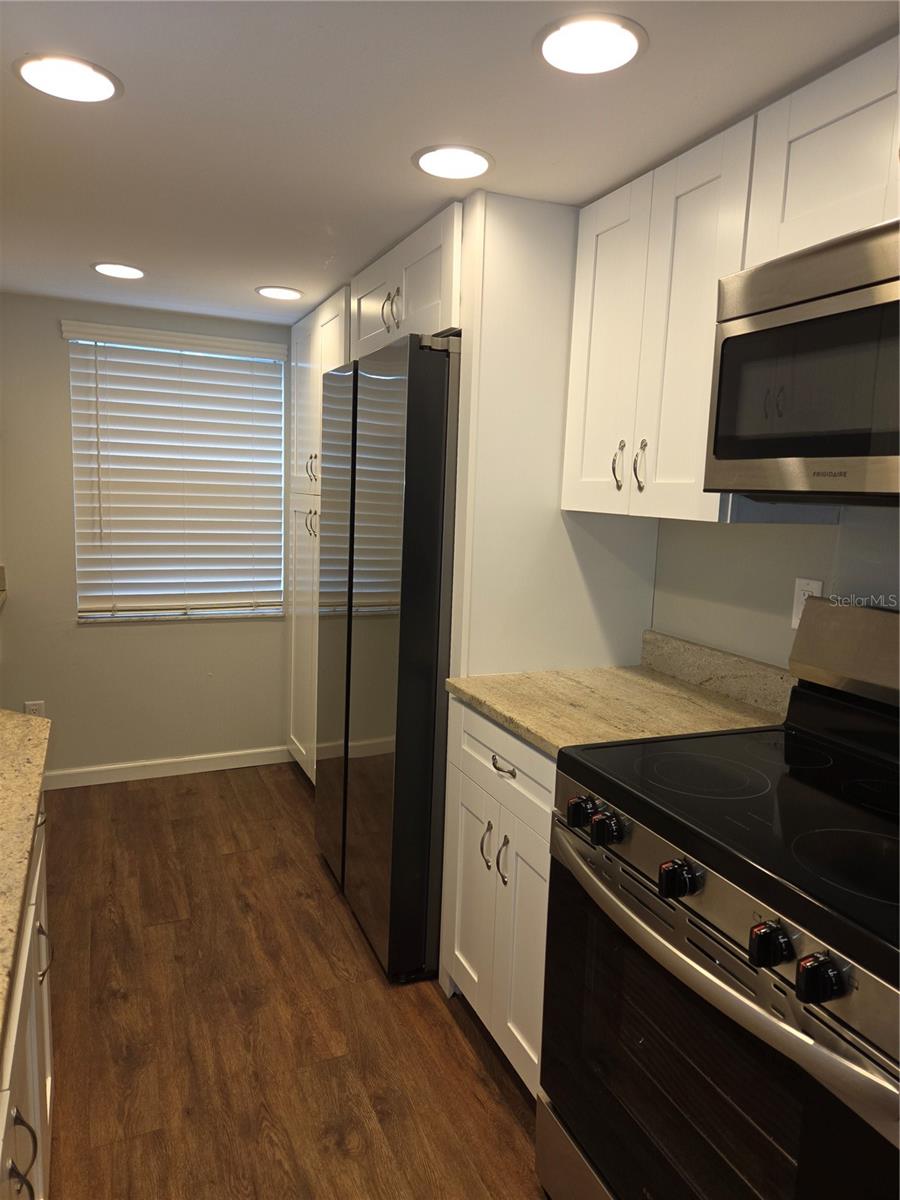 Newer stainless steel appliances and large pantry