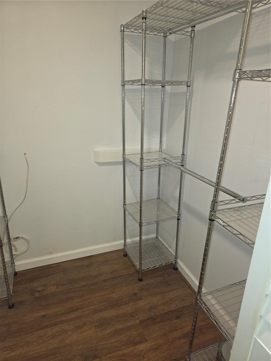 Walk-in closet in primary suite