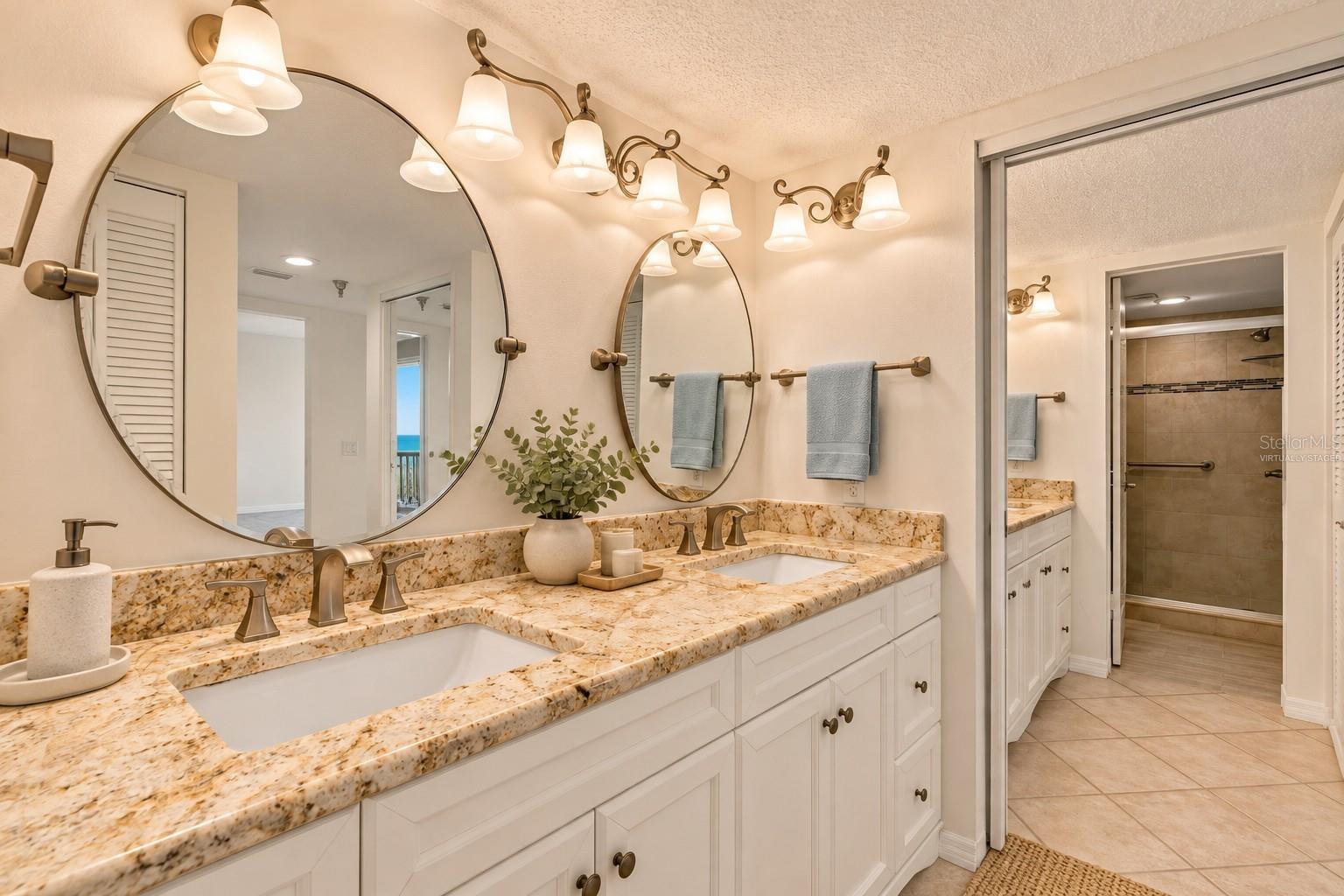 Virtually staged photo.Primary bathroom