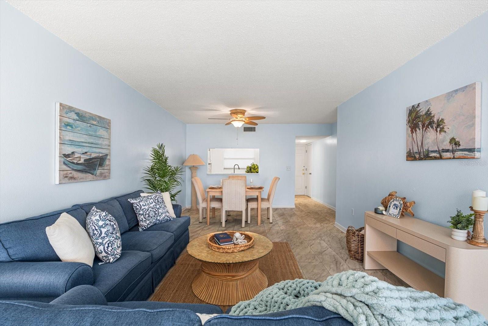 Imagine unwinding here after a fun filled day at the tennis courts, gym, pool, and community pier!