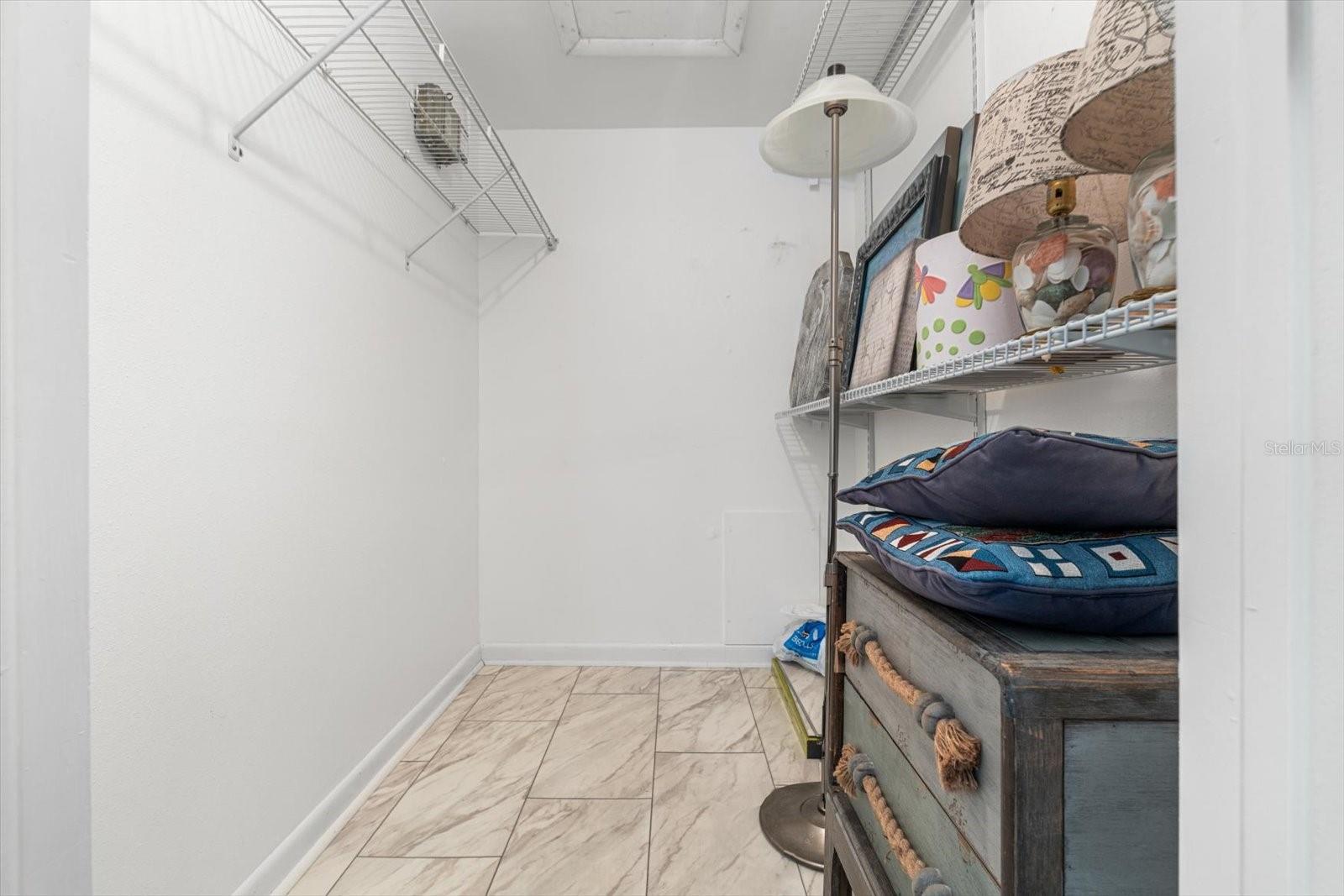 Ample-sized walk-in closet in the primary bedroom.
