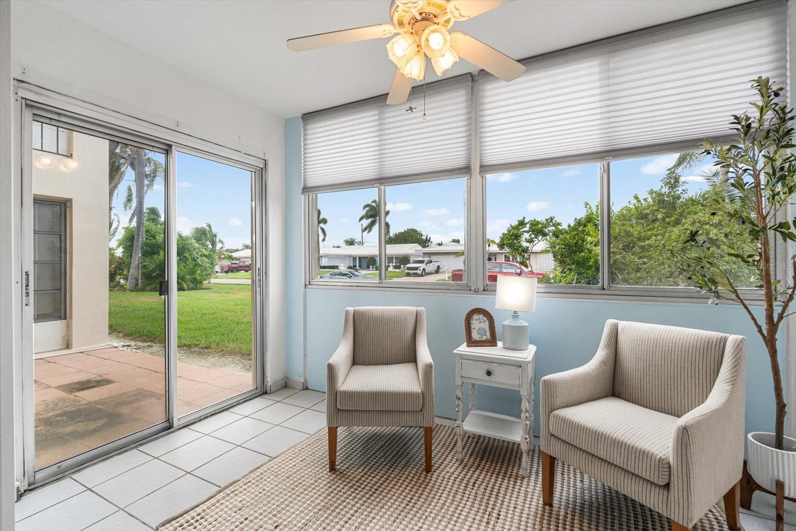 A light and bright Florida room, creates an attractive extra space.