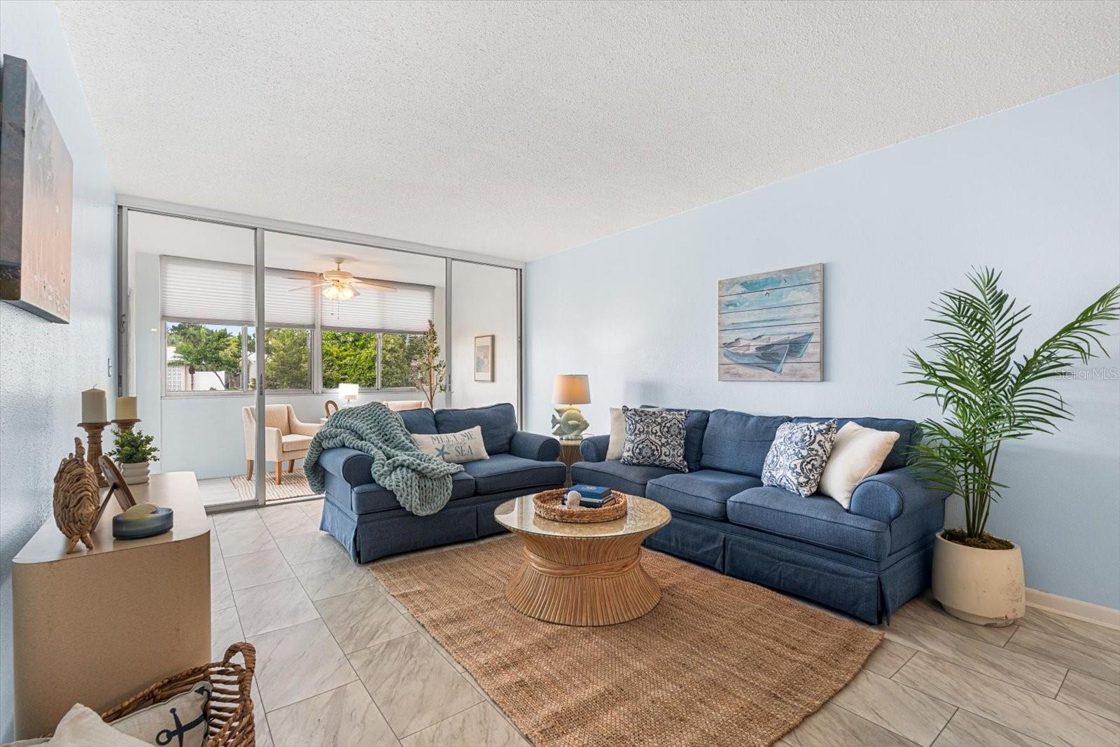 Natural light fills the living spaces of this condo, creating wide open spaces, perfect for living and entertaining.
