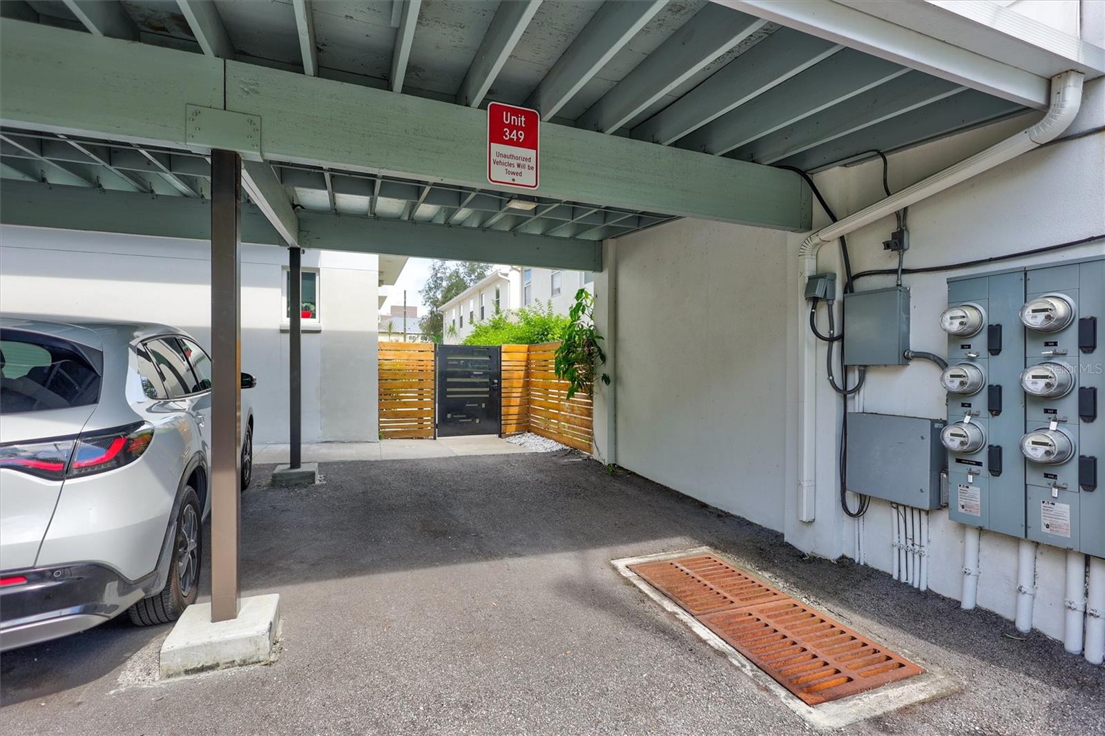one covered, designated parking space.