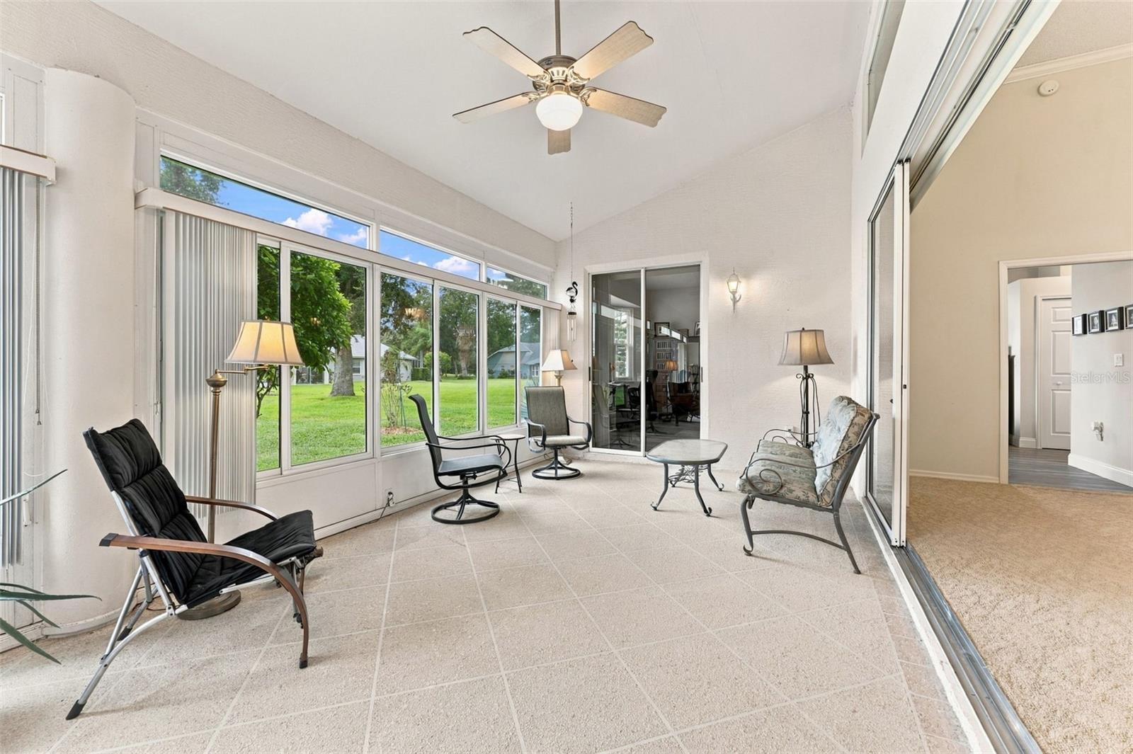 Bright Sunroom with Backyard Views