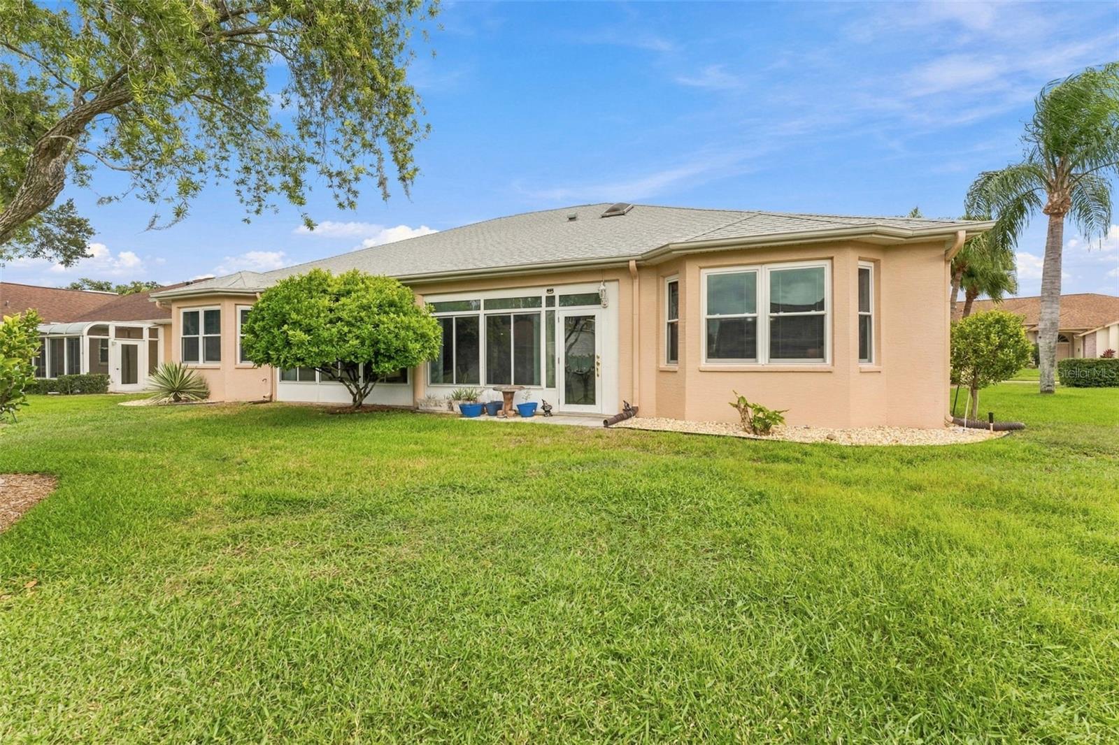 Rear Exterior & Spacious Lawn