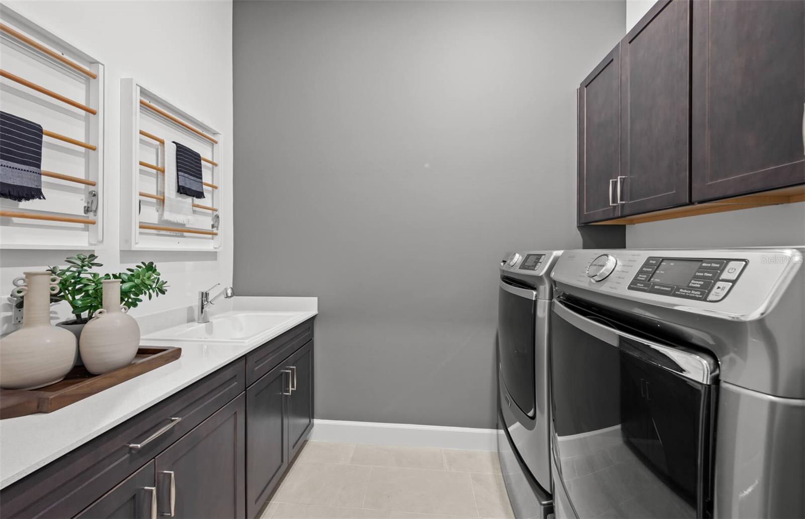 Photos depict staged model home.
