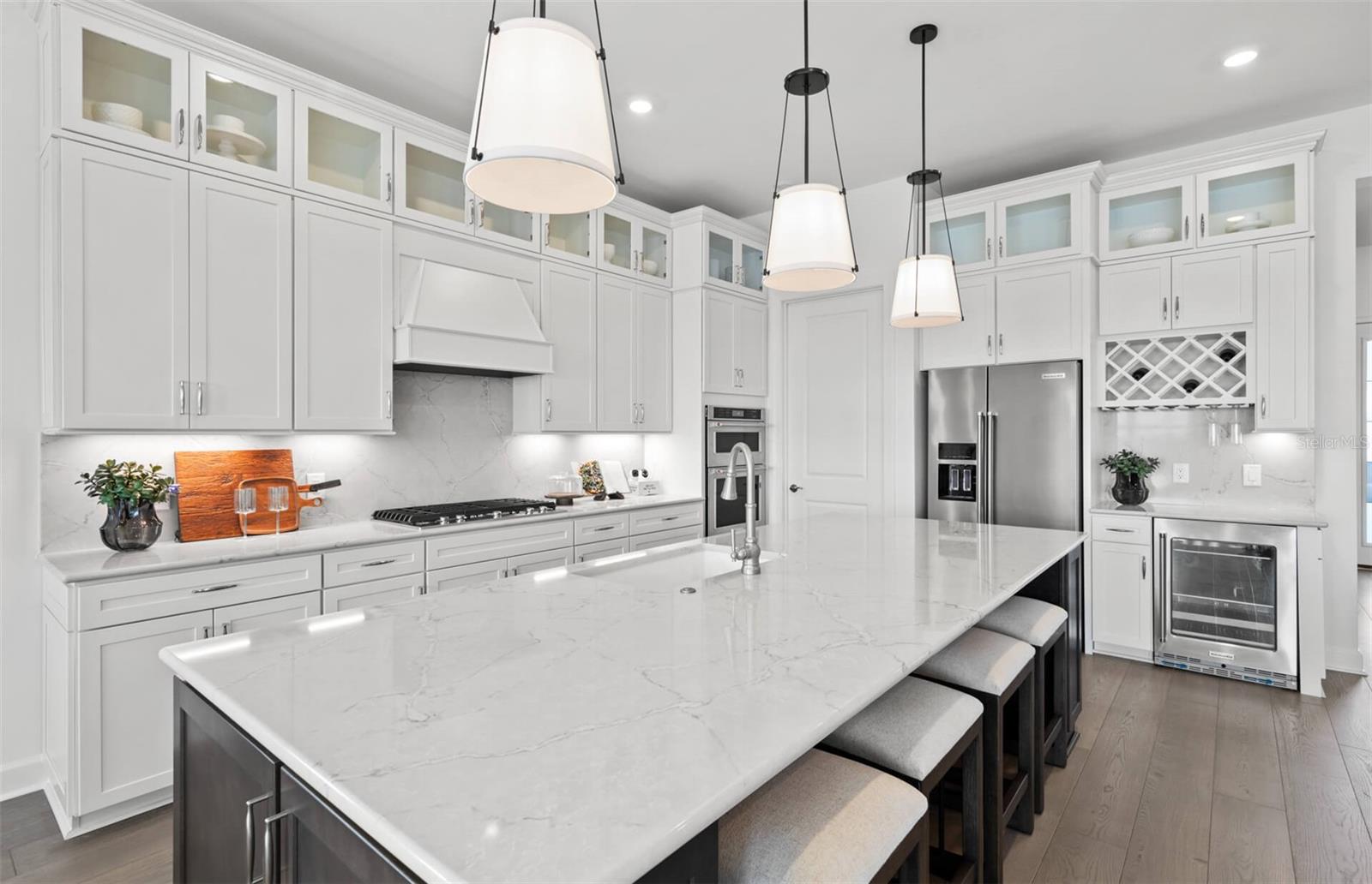 Photos depict staged model home.