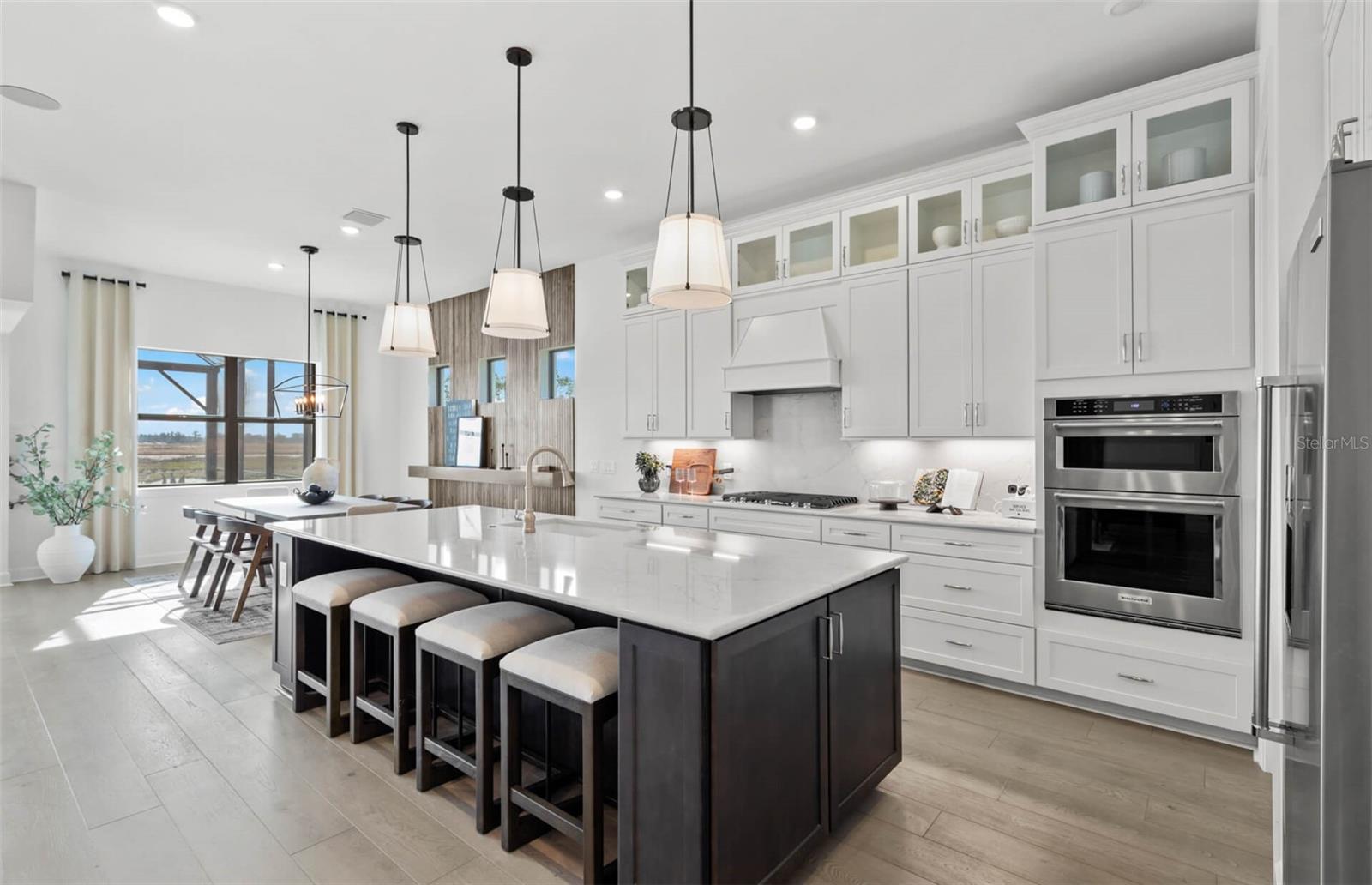 Photos depict staged model home.