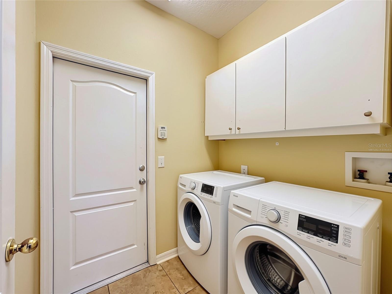 Virtually Staged Laundry Room (washer/dryer)