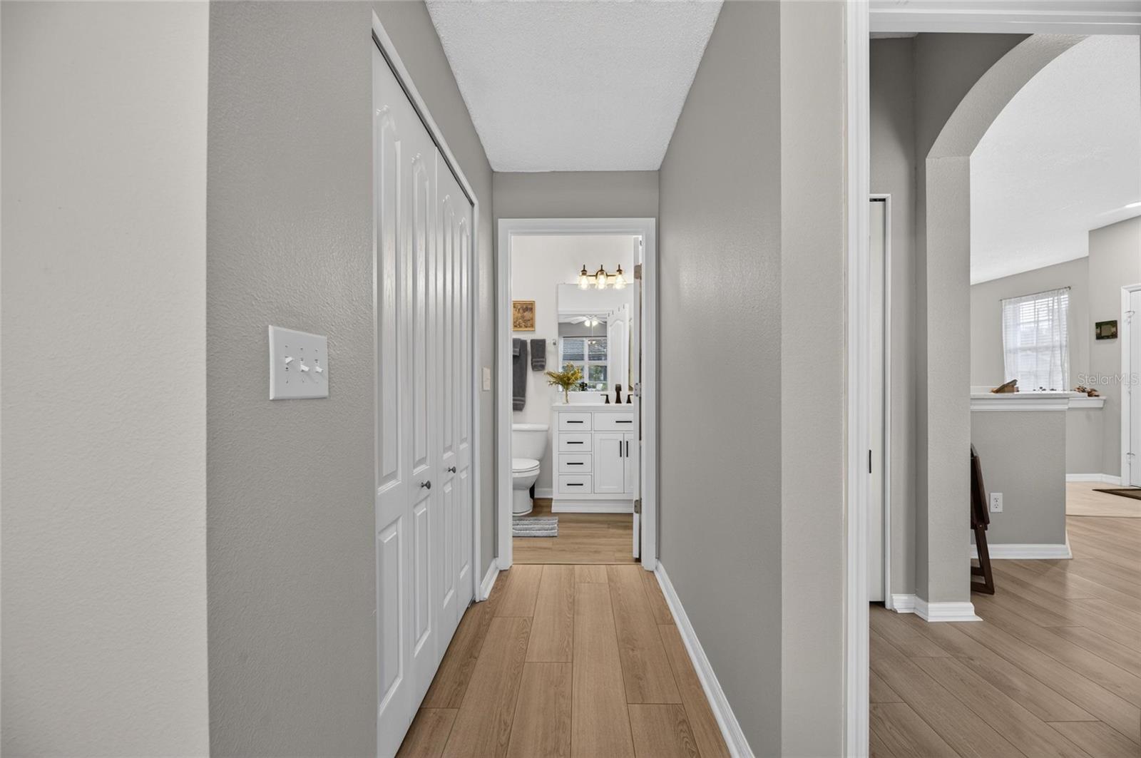 Primary walk-in closet leading to ensiute bathroom