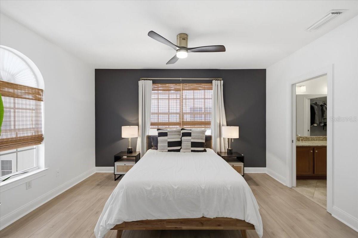 Primary Suite with custom blinds and new LVP Flooring