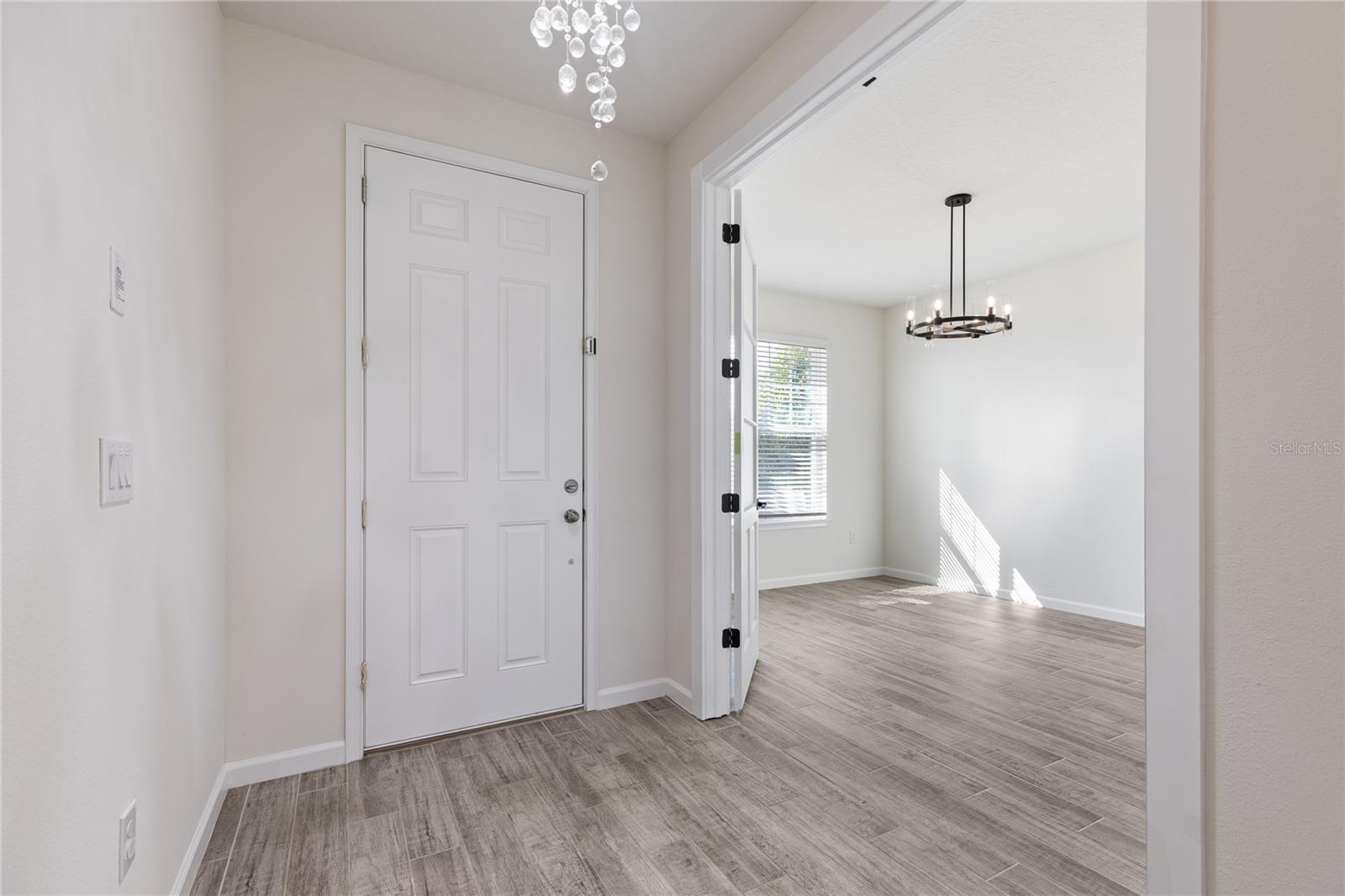 Front door inside and Front bonus room pic 1