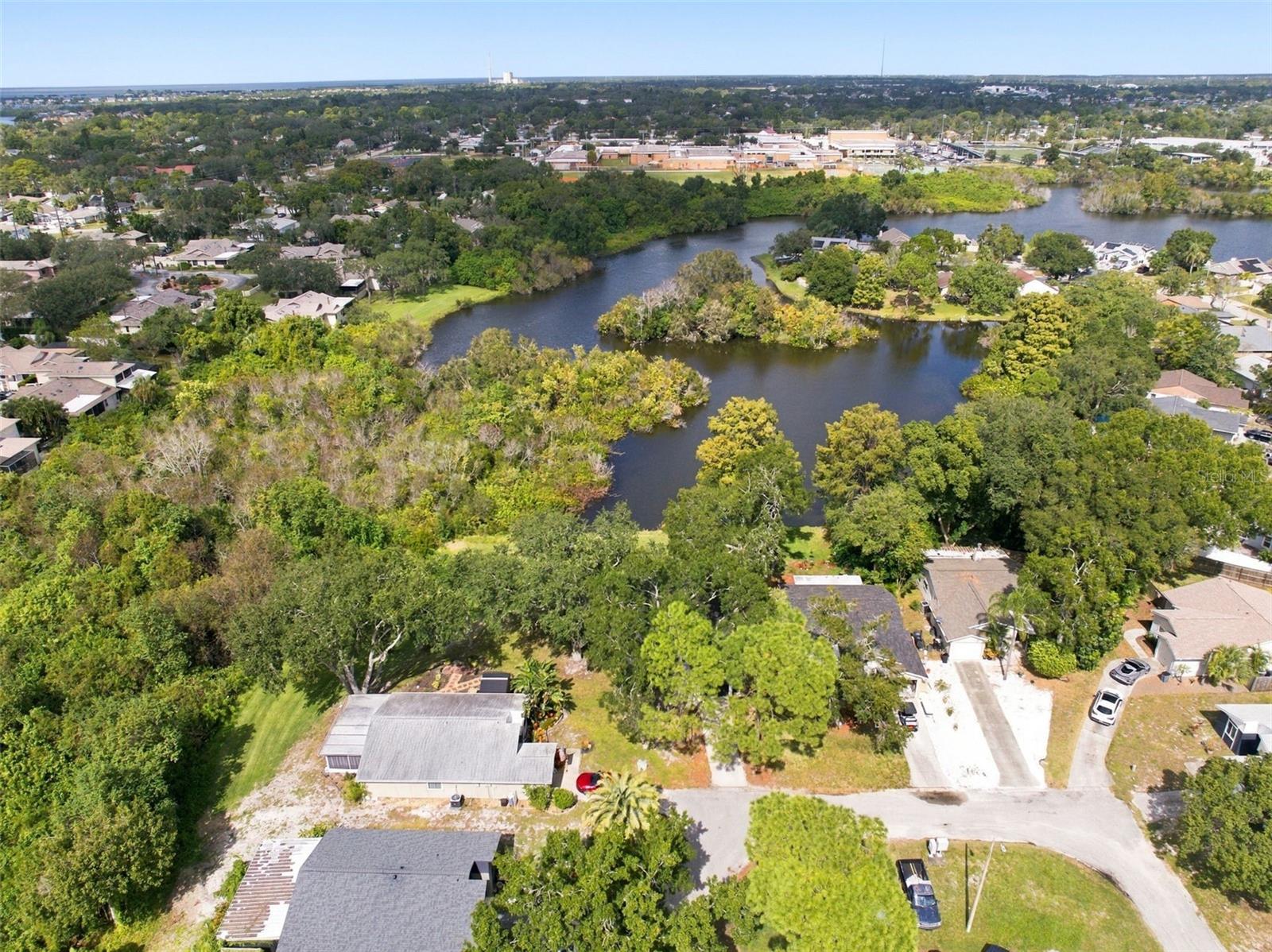 Ariel View showing Tarpon Springs High School across the Lake
