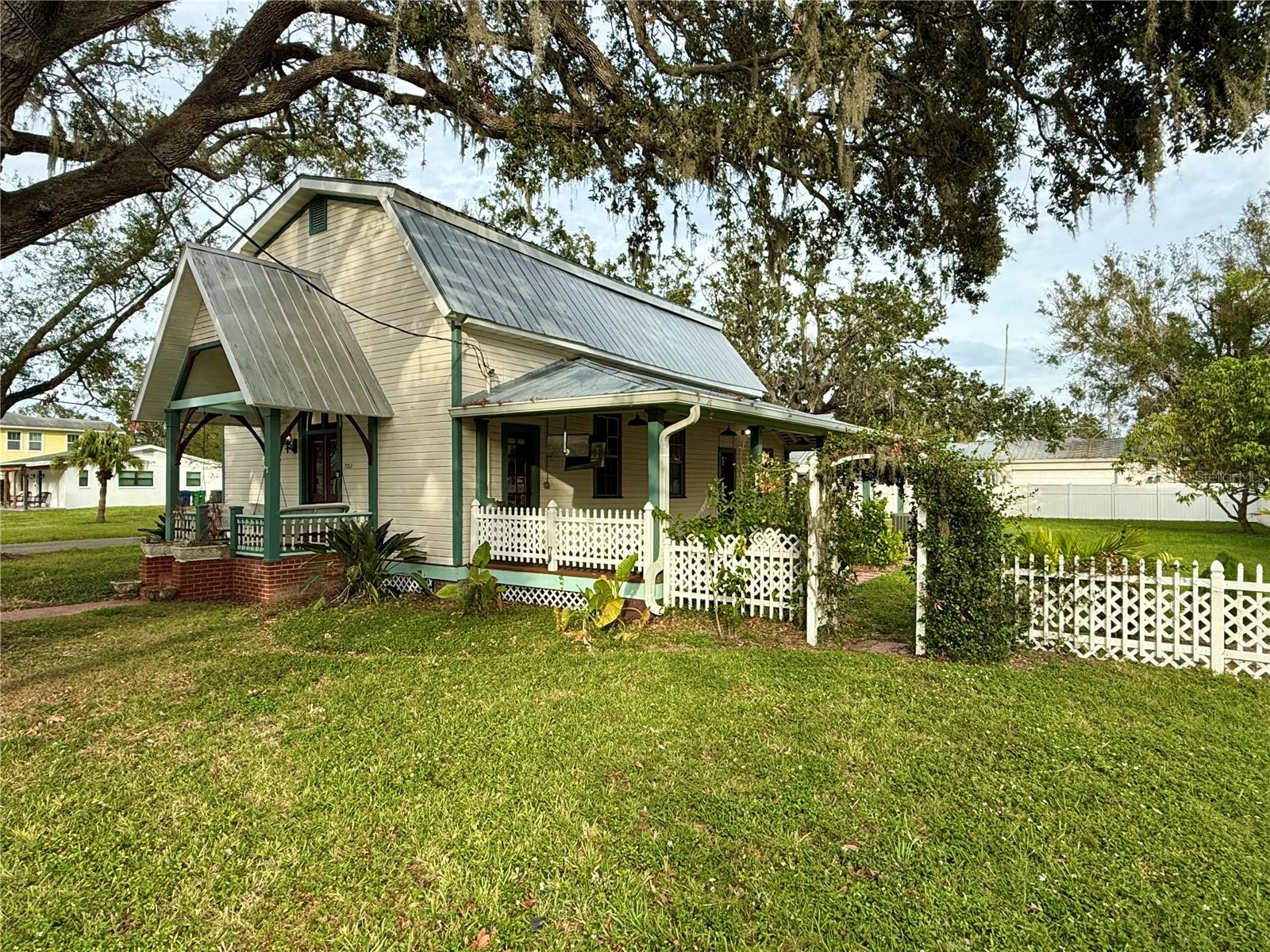 Historic Church converted to Single Family home! Situates on a HUGE corner lot with a big fenced back yard