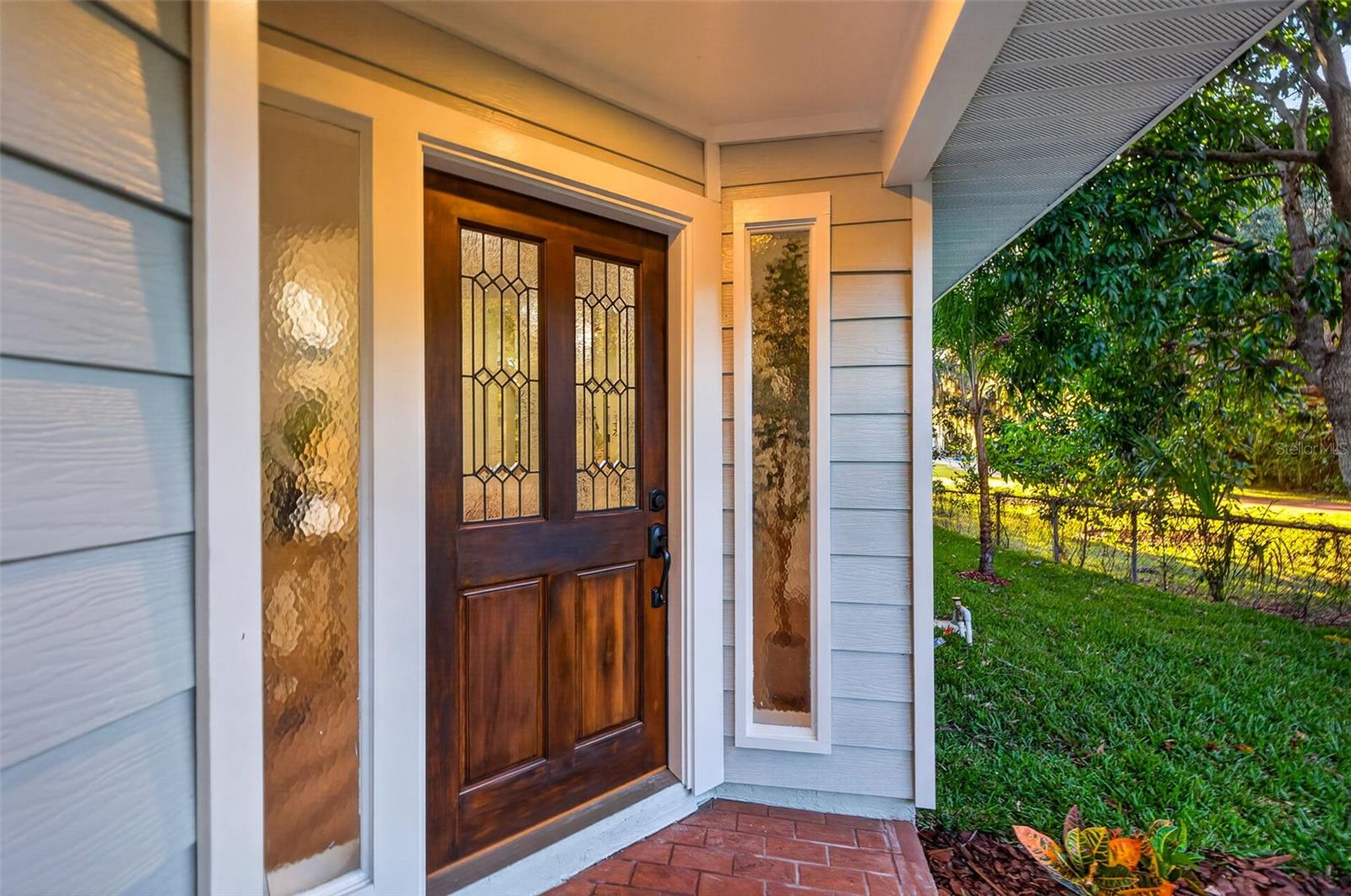 Wood Front Door with decorative leaded-glass panels