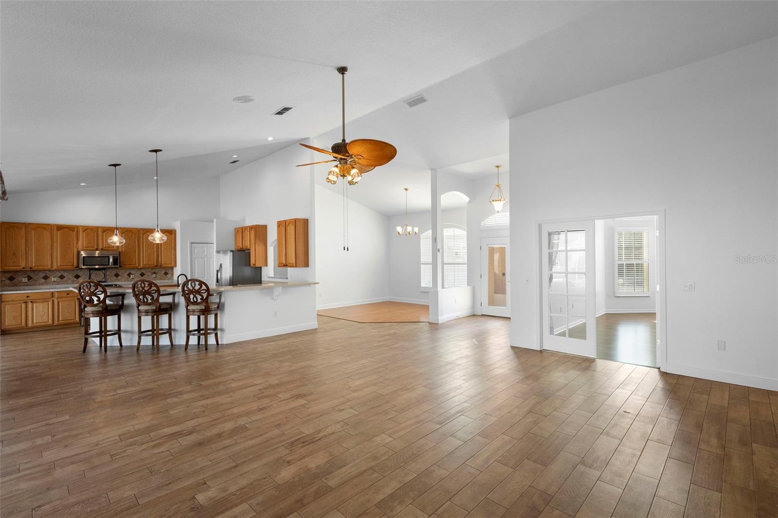 LIVING ROOM W/KITCHEN VIEW