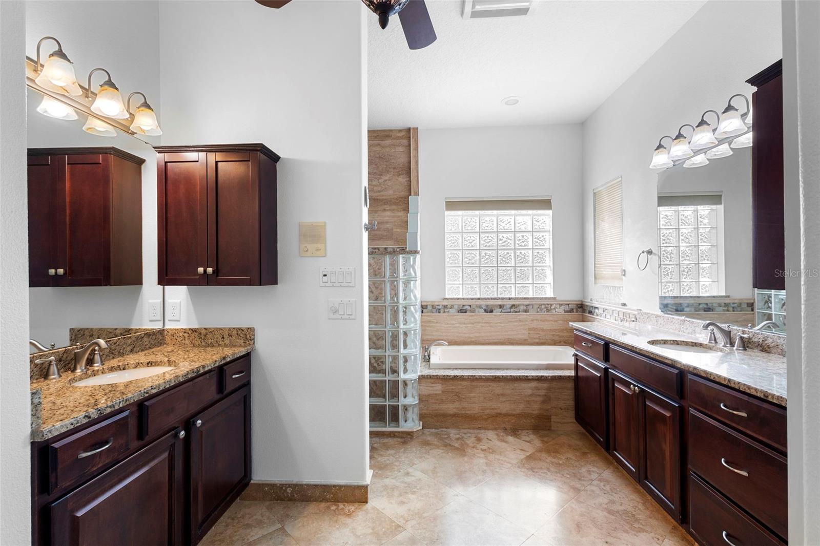 PRIMARY BATHROOM WITH TRAVERTINE FLOOR