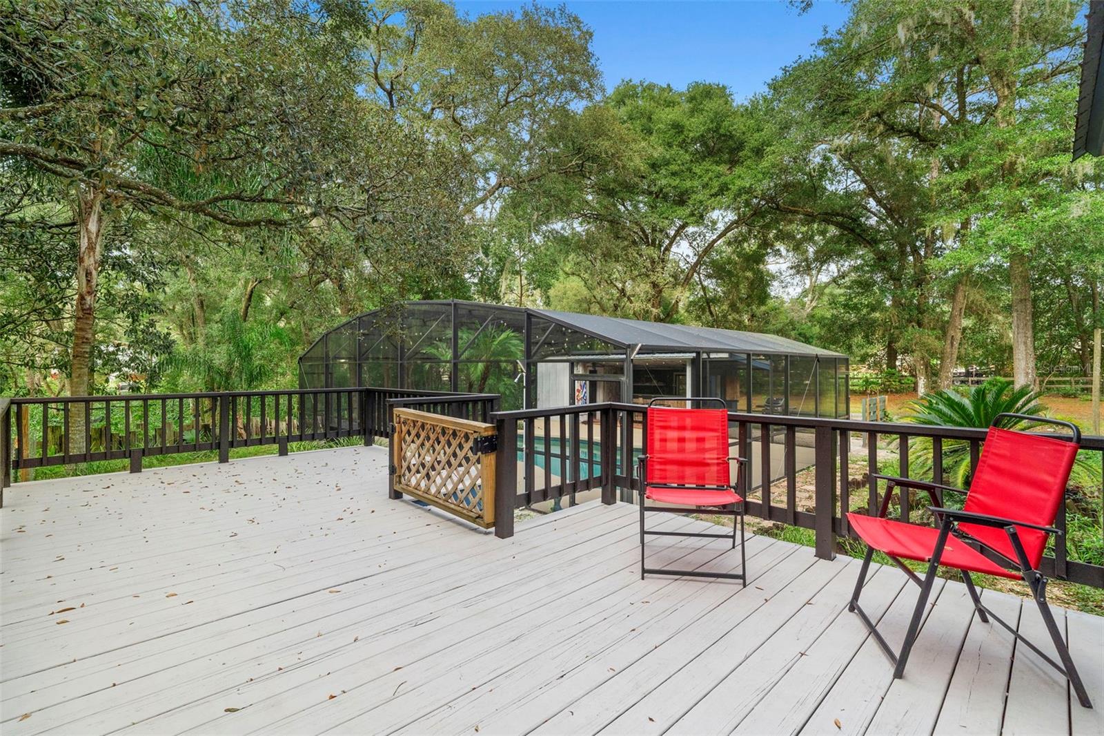 Exterior rear patio leading to pool