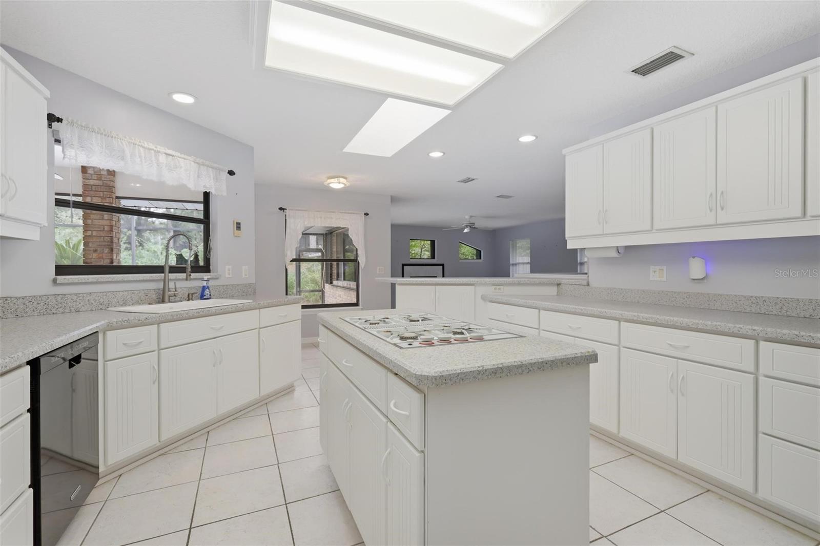 Kitchen looking towards back/family room.