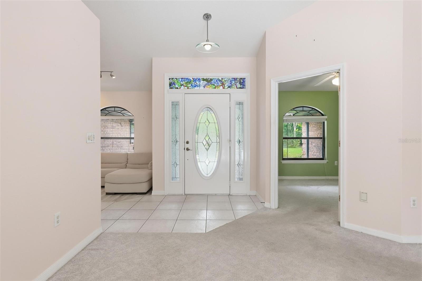 Living room looking to front door.