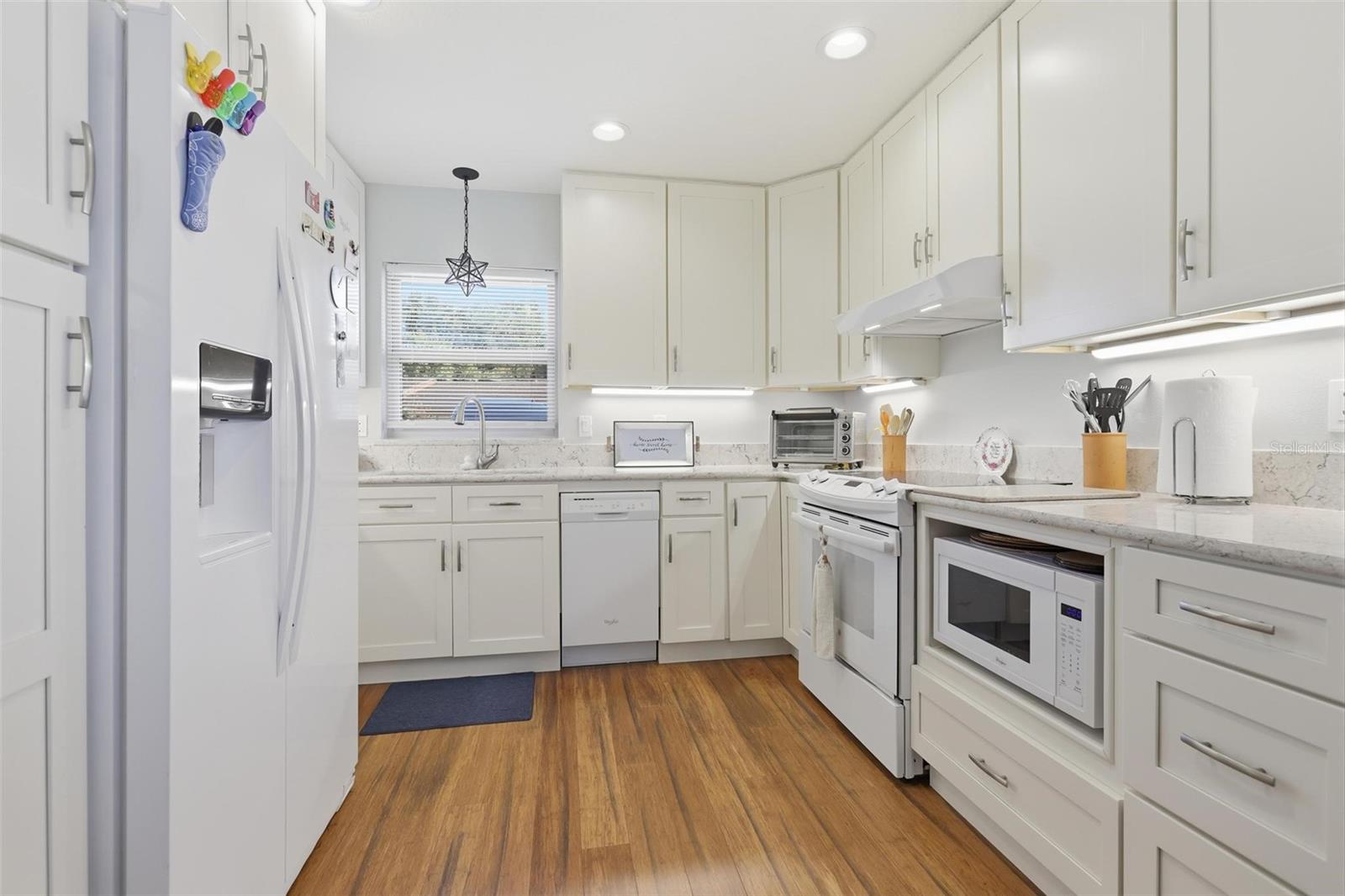 Full Kitchen with Granite counters and upgraded lighting