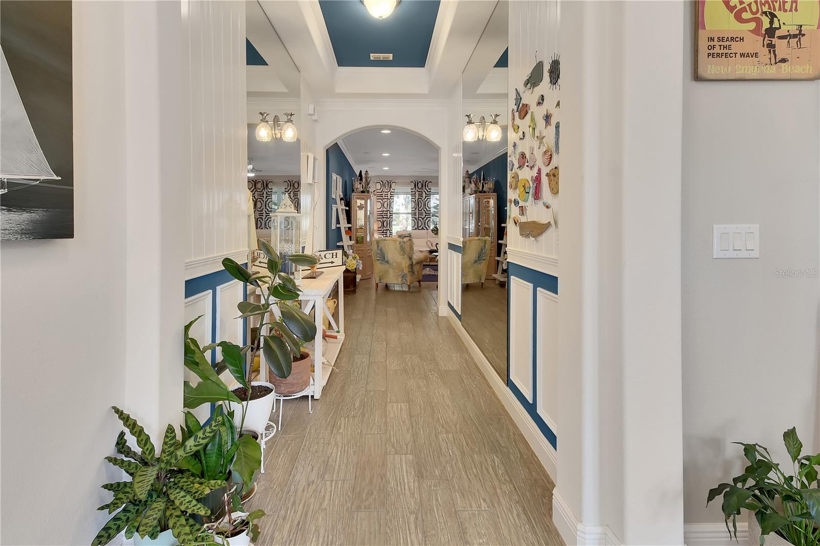 Coastal foyer with wainscotting